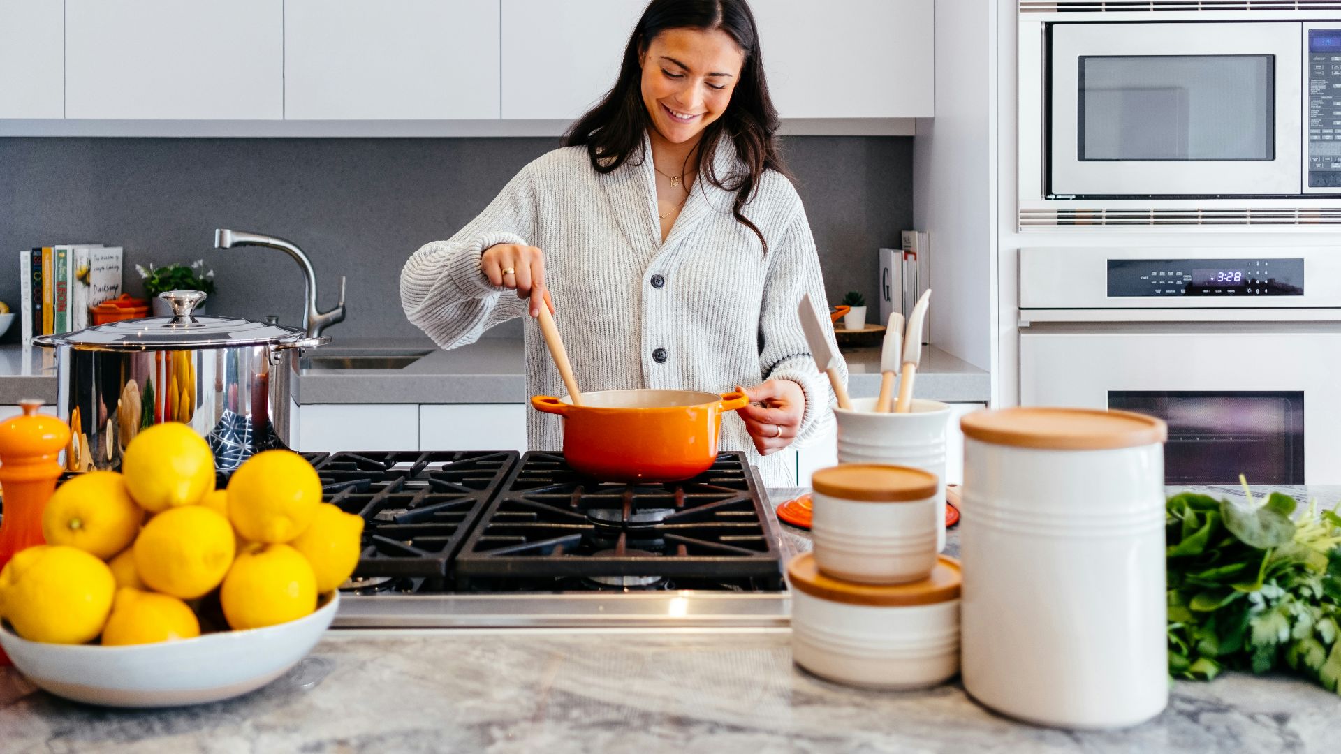 woman cooking inside kitchen room