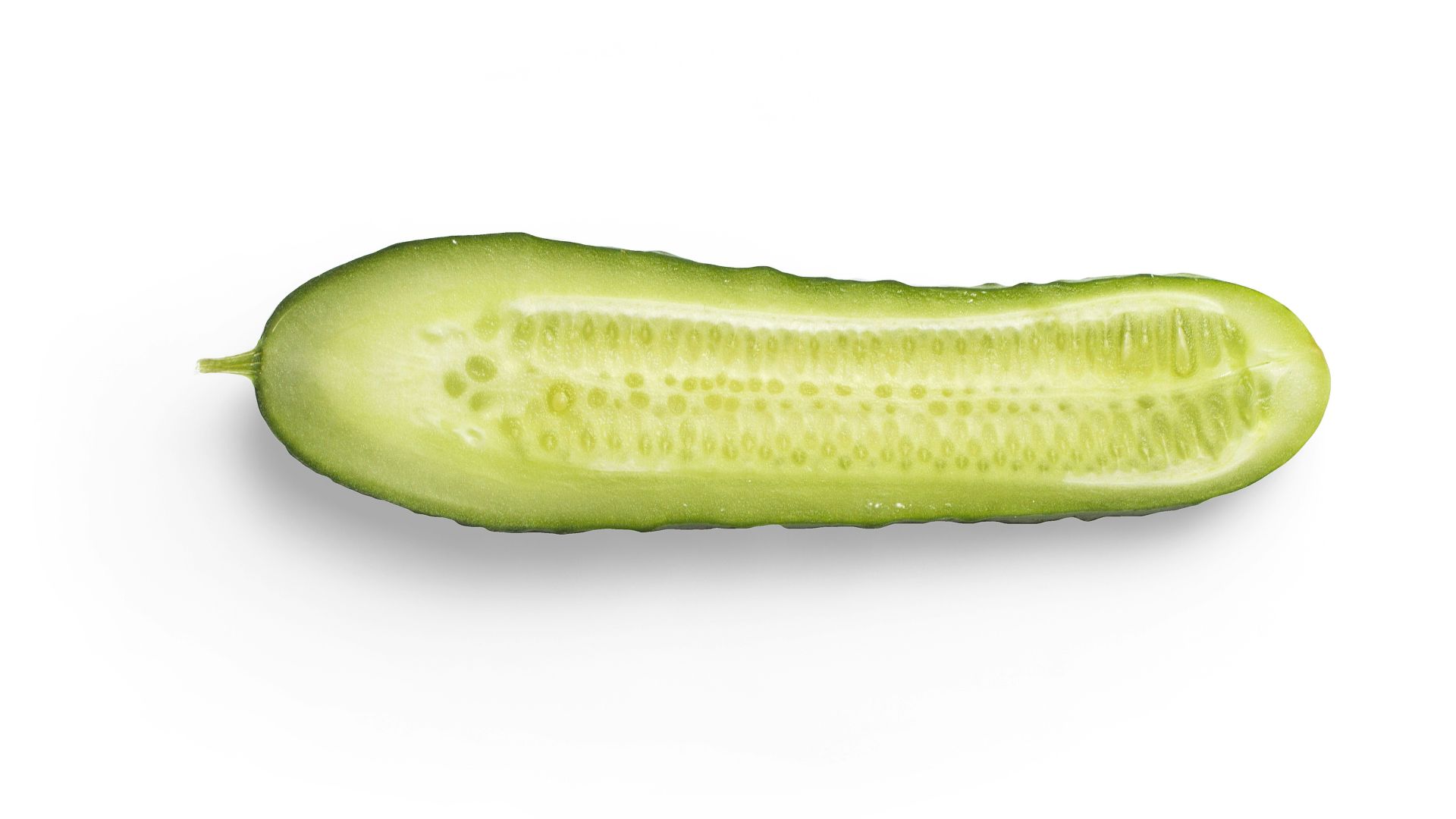 green cucumber on white background