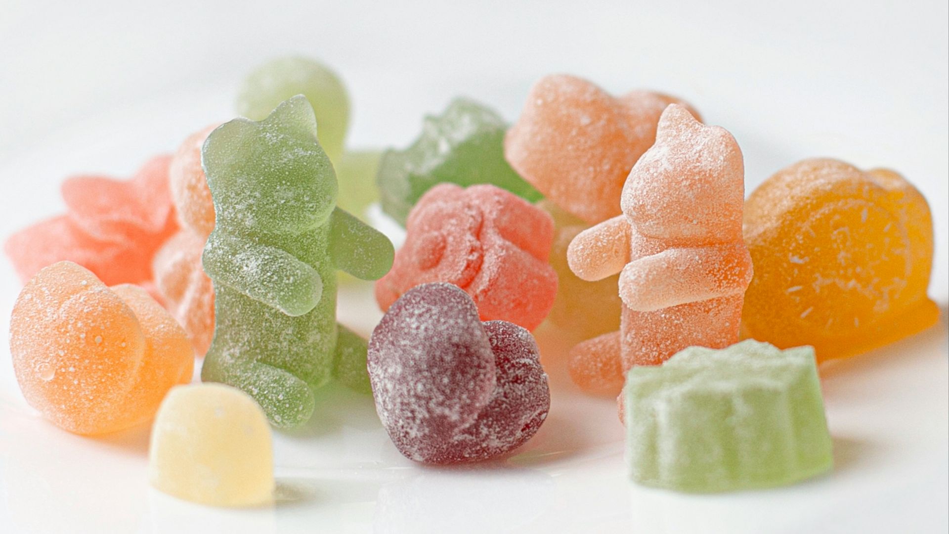 orange green and pink candies