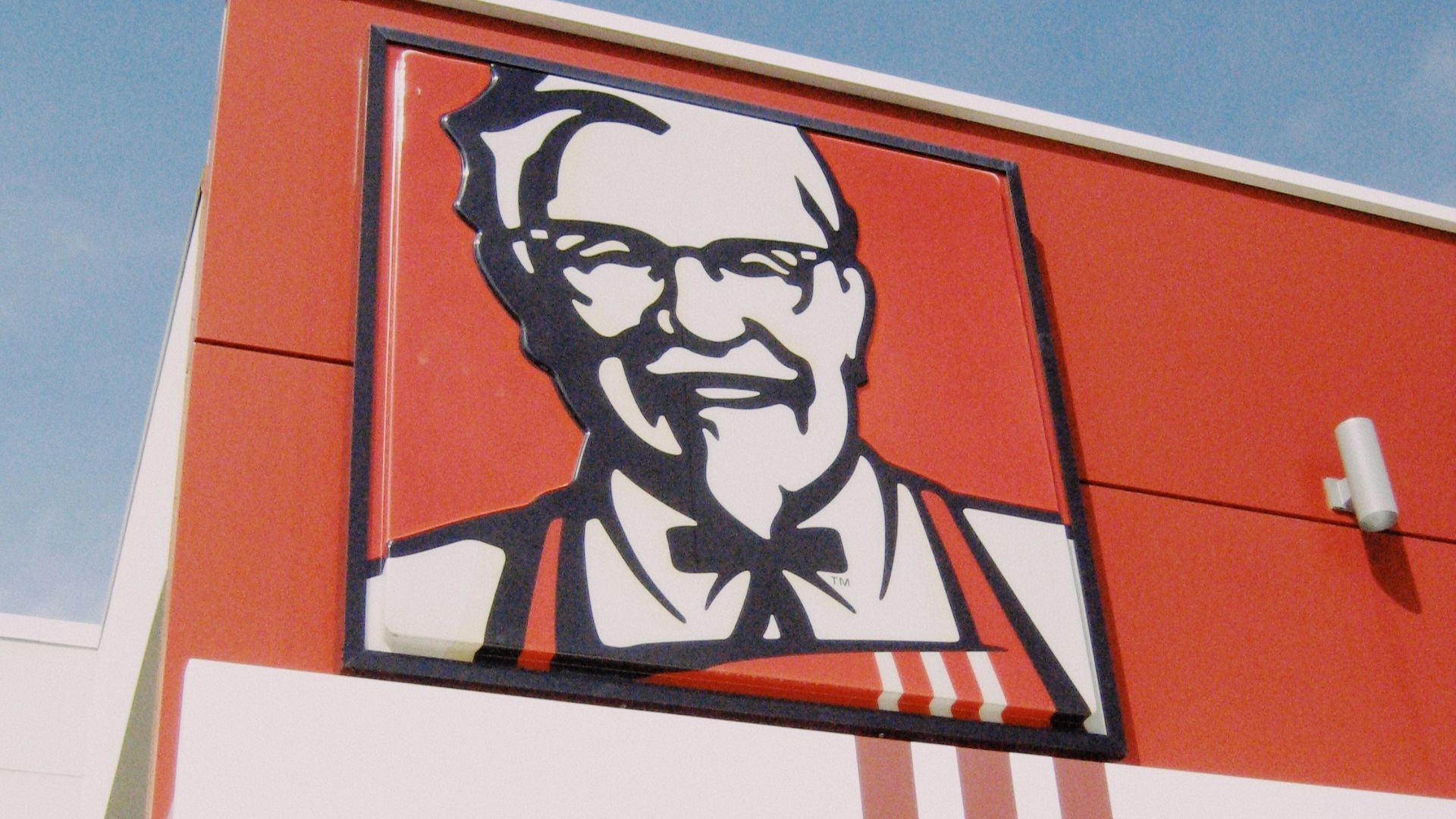 a picture of a man on the side of a building