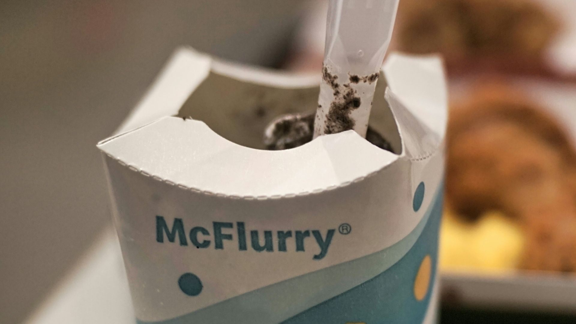 white and blue paper bag