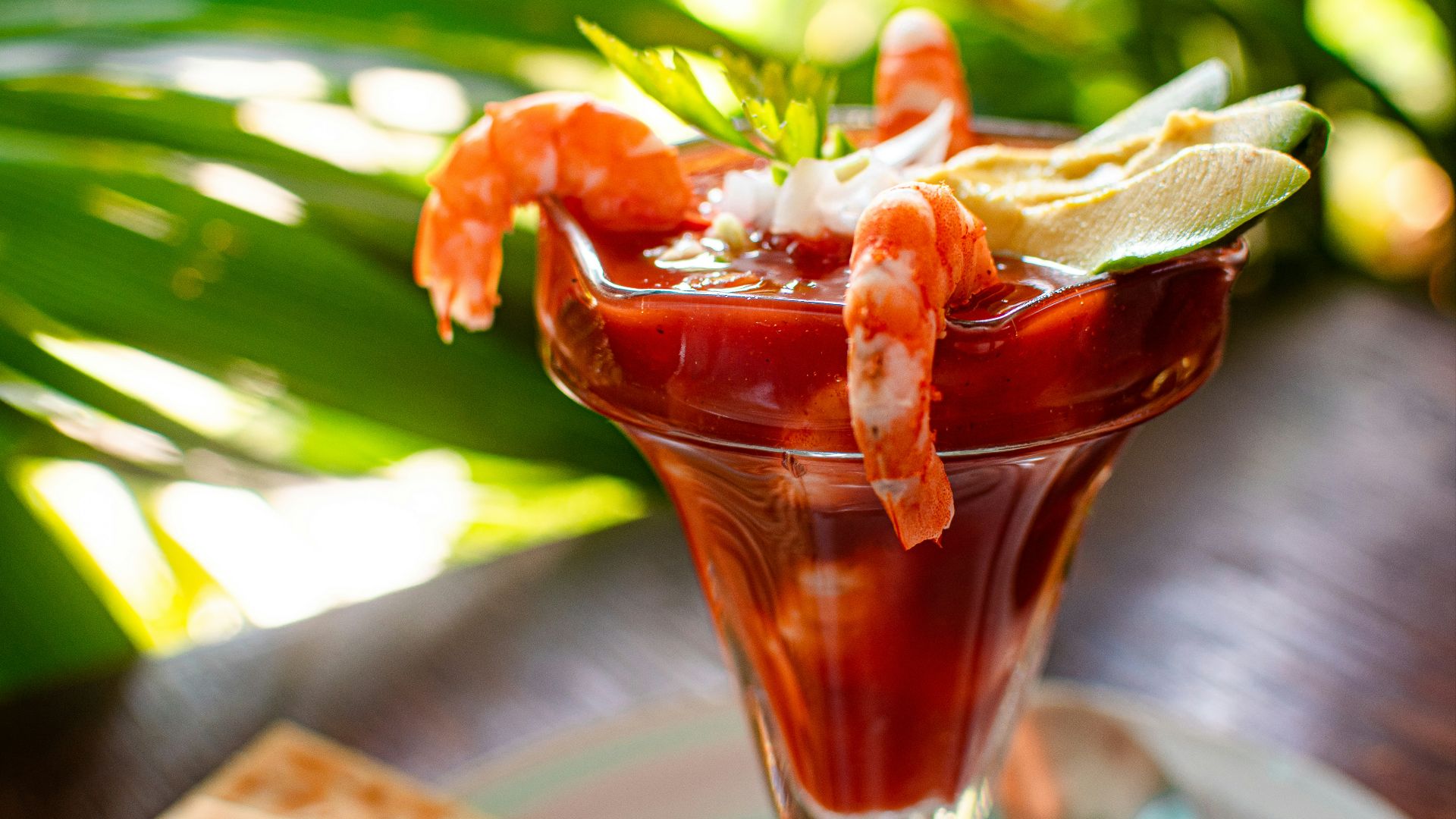 clear drinking glass with red liquid