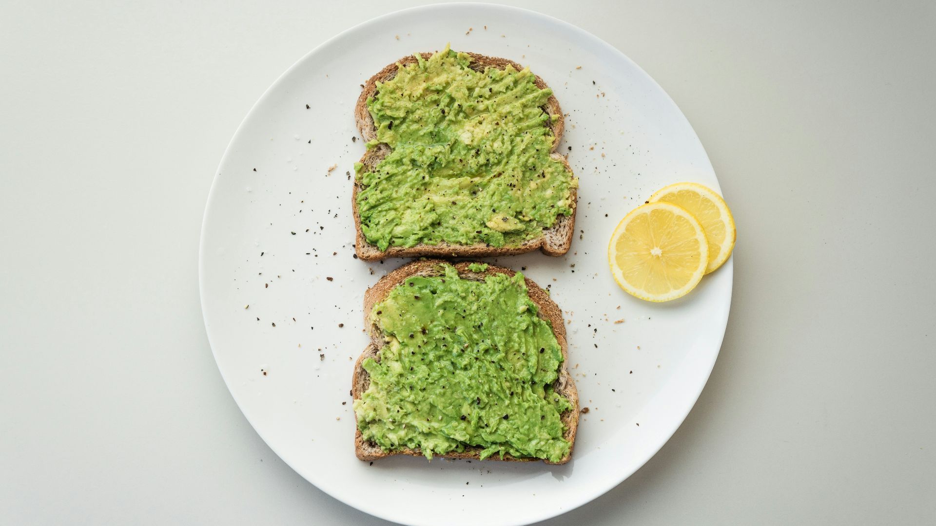 green and brown vegetable on white ceramic plate