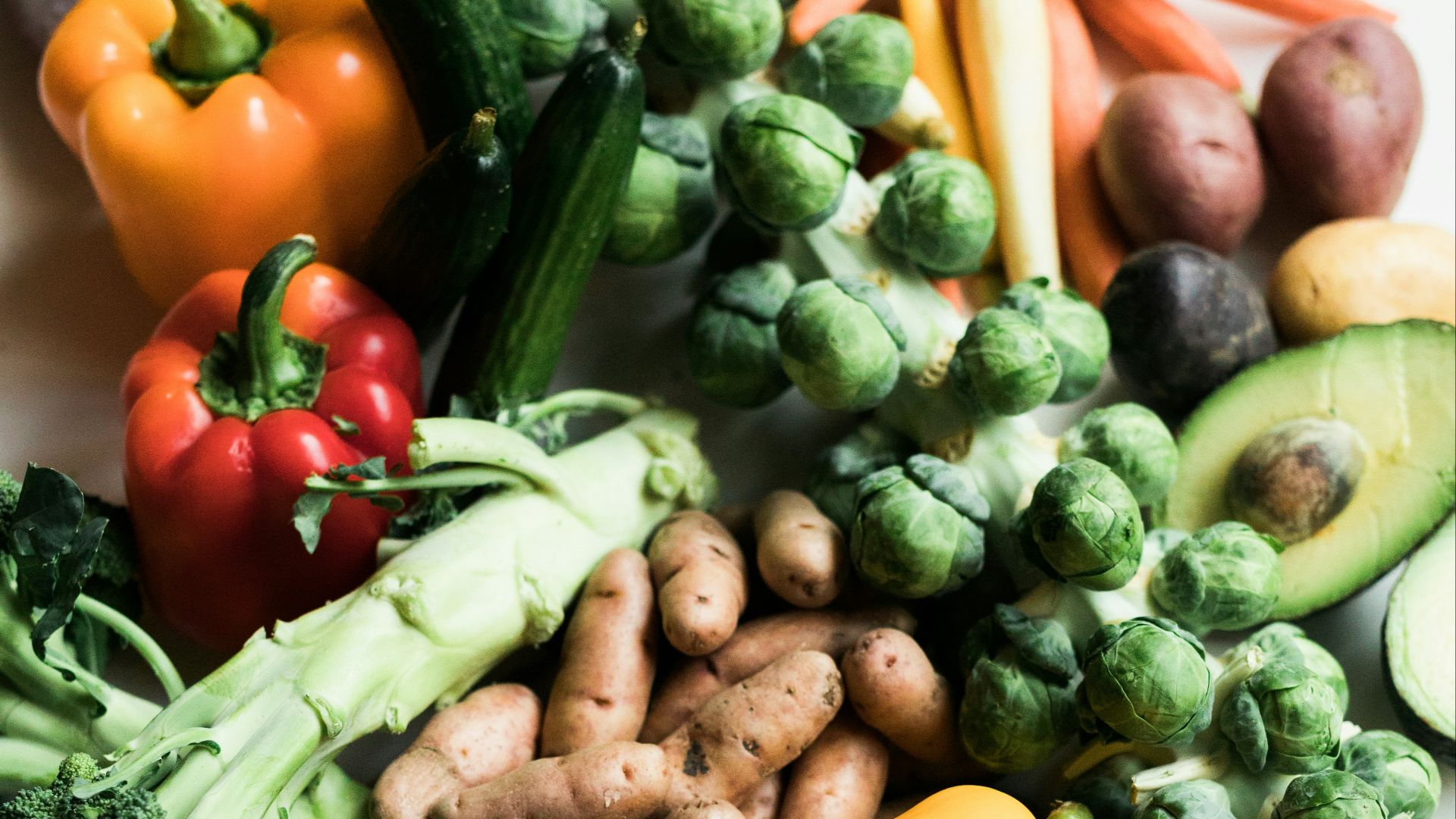 sliced carrots and green vegetable
