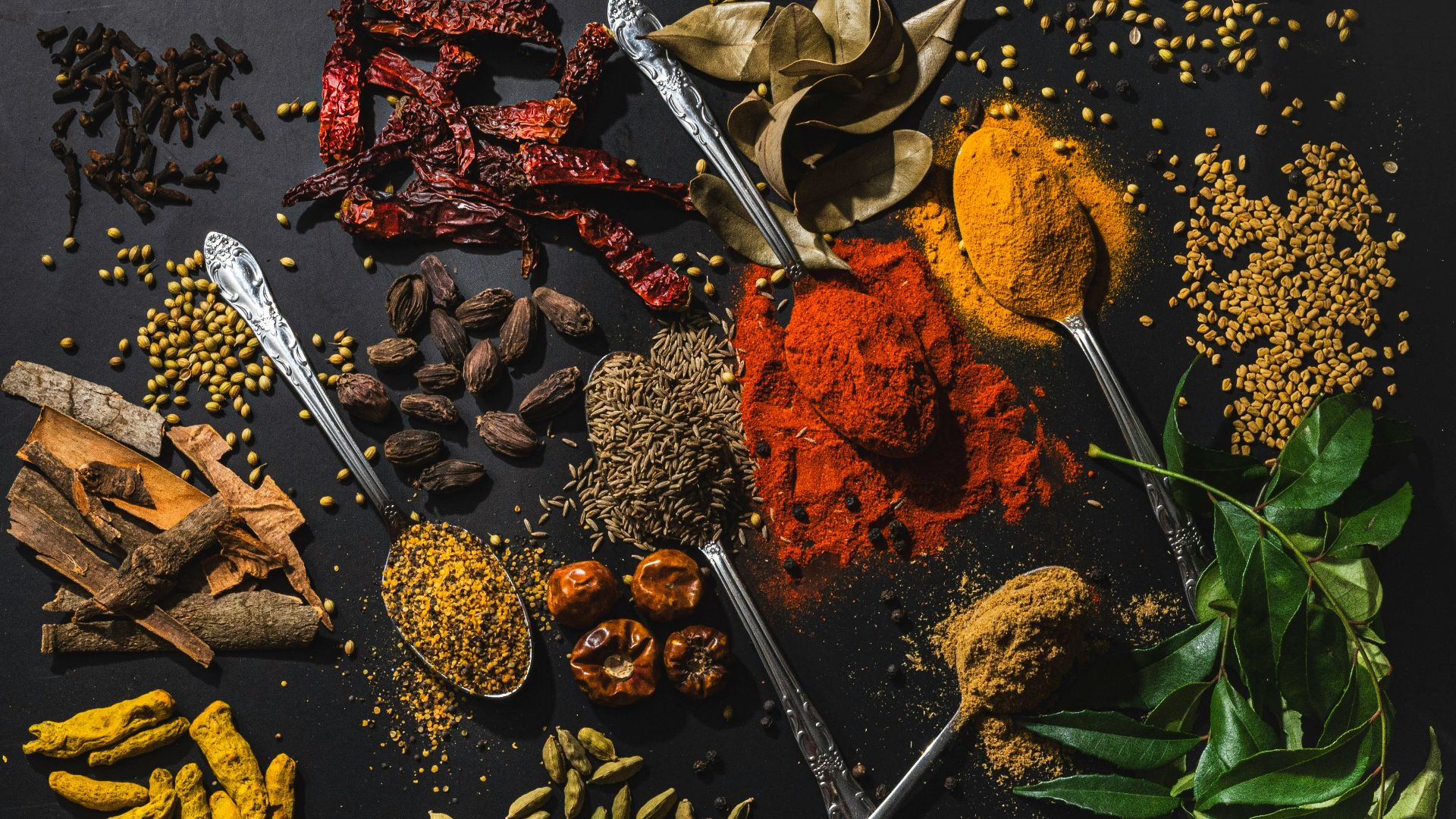 a table topped with different types of spices