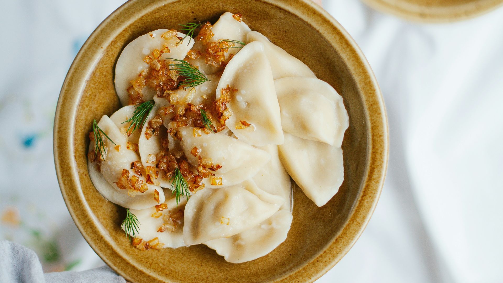 white cream on brown round bowl