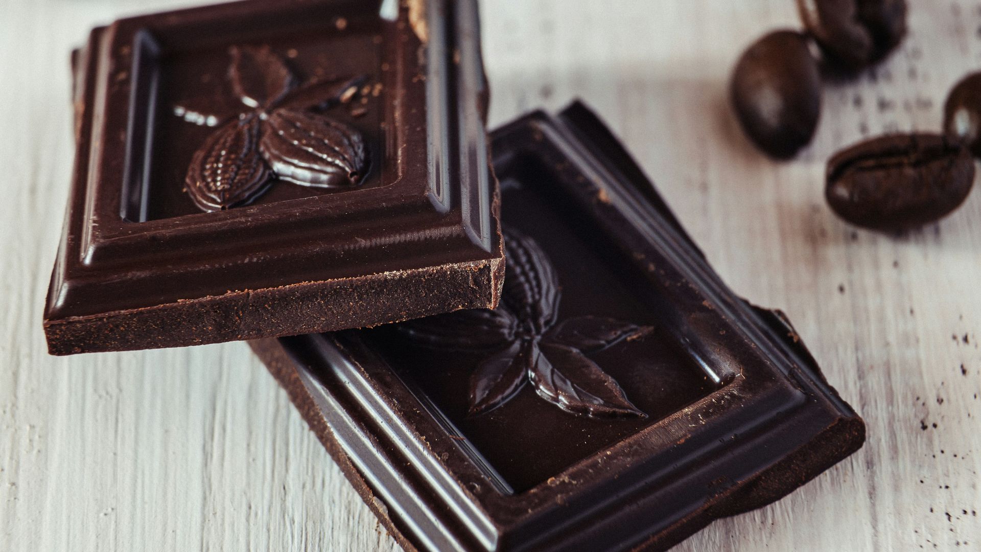 a couple of pieces of chocolate sitting on top of a table