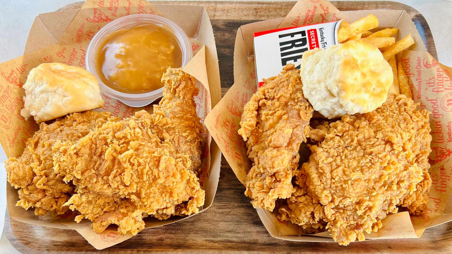 a couple of trays of food on a table