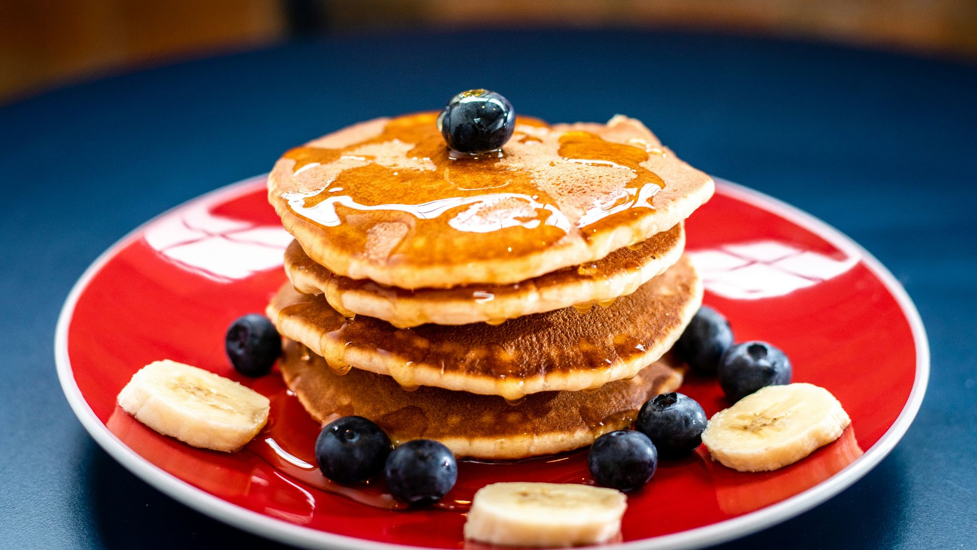 baked pancake with blueberry and slice of banan