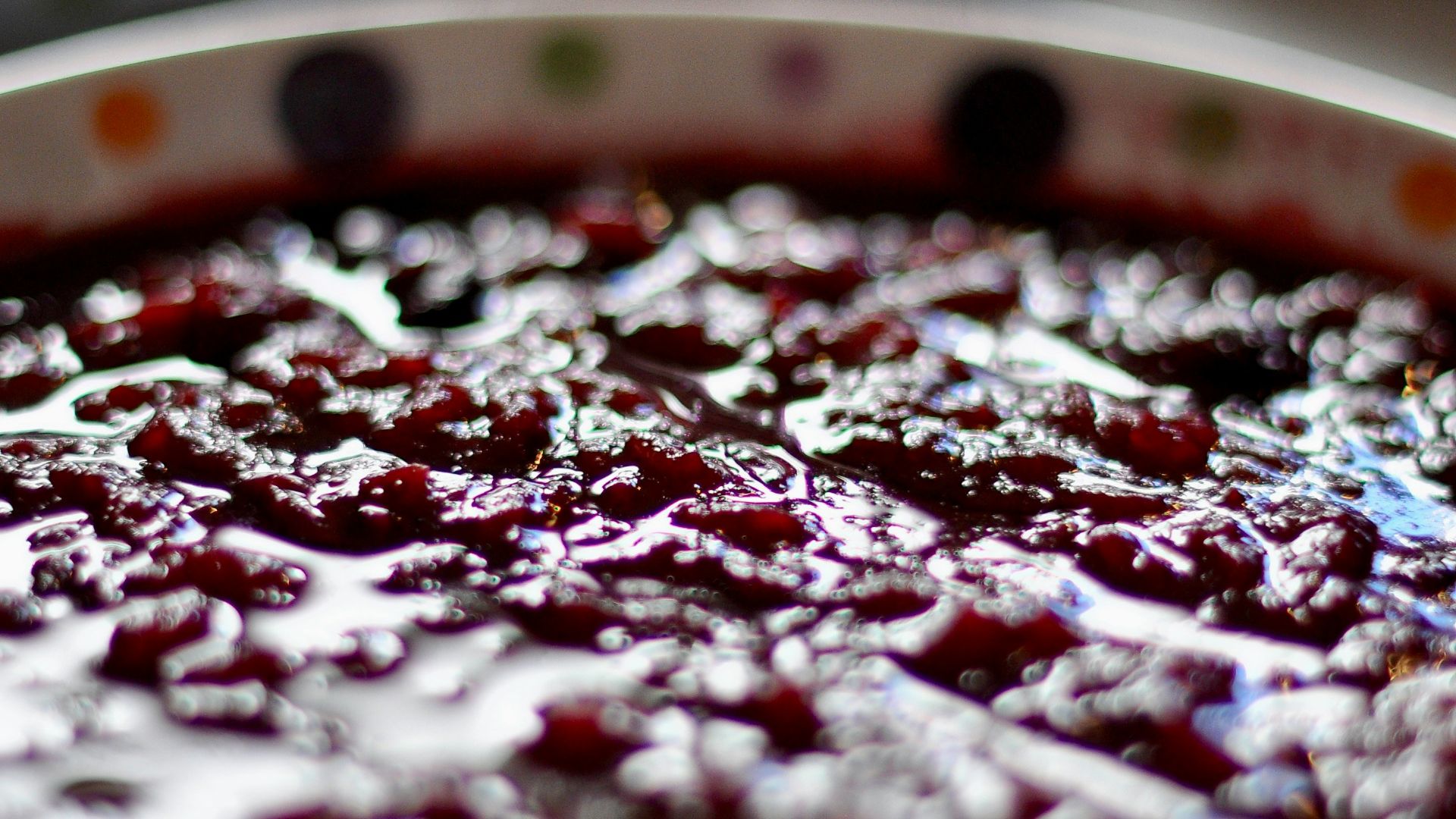 Close-up of a bowl of dark berry compote