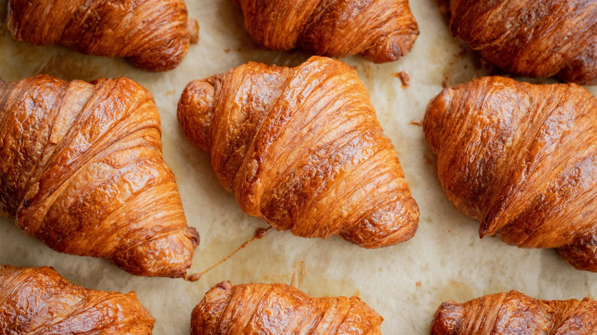 a bunch of croissants that are on a table