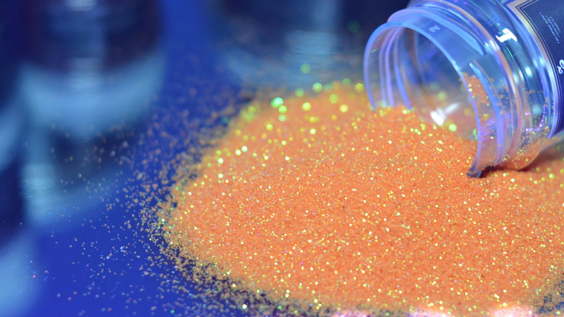 orange beads in clear plastic container