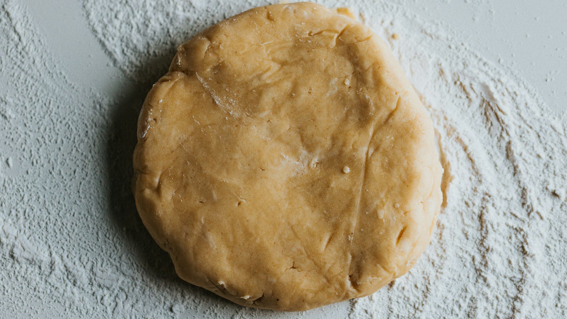 brown bread on white textile