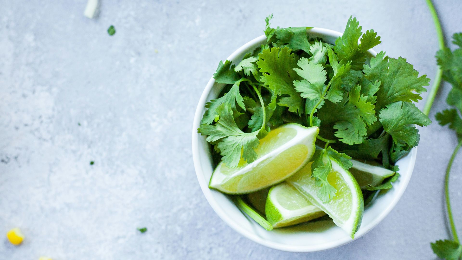 sliced lime in white ceramic bowl