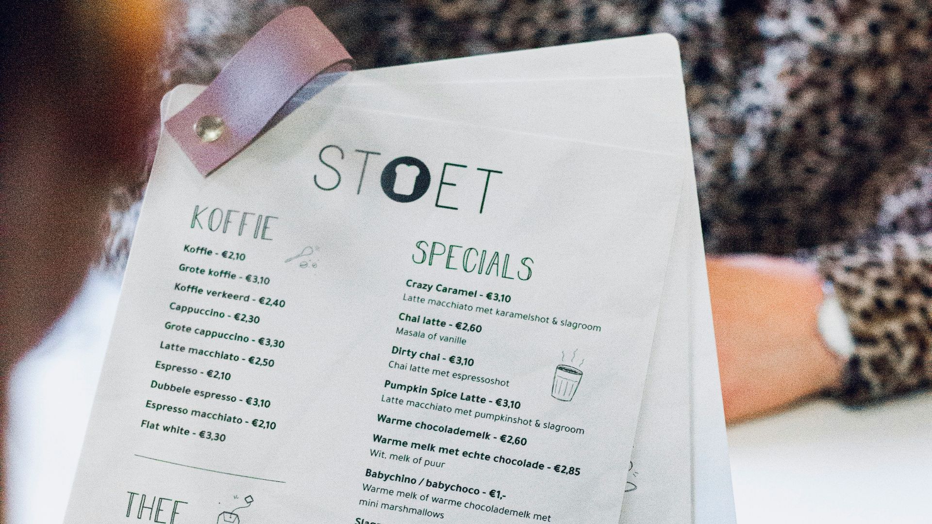 person holding white printer paper