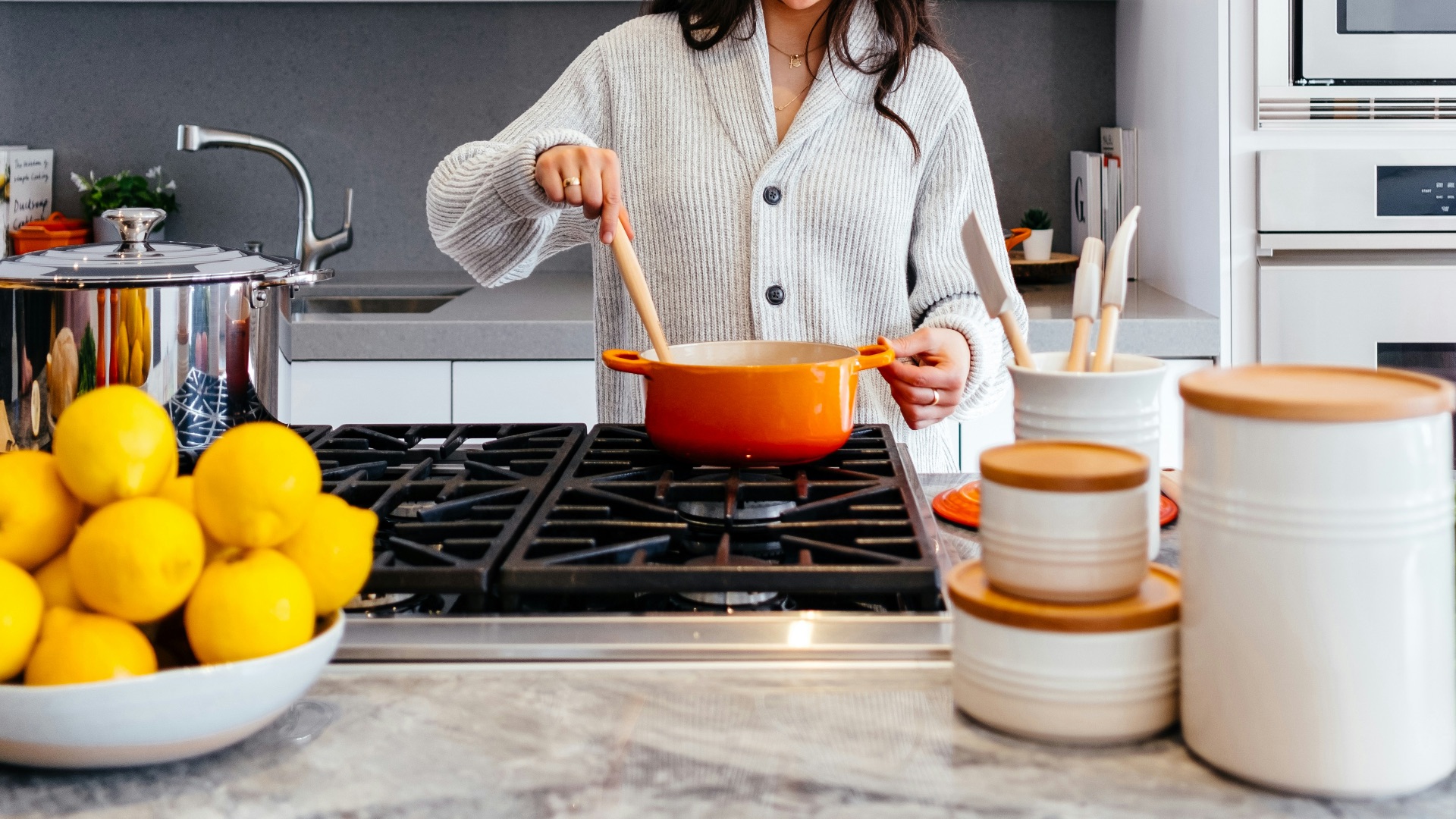 woman cooking inside kitchen room