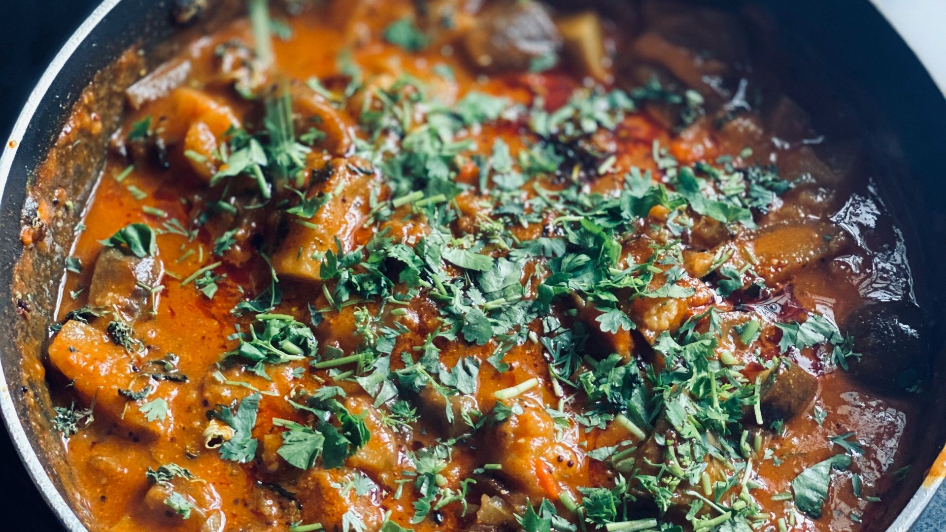 cooked food in black cooking pot