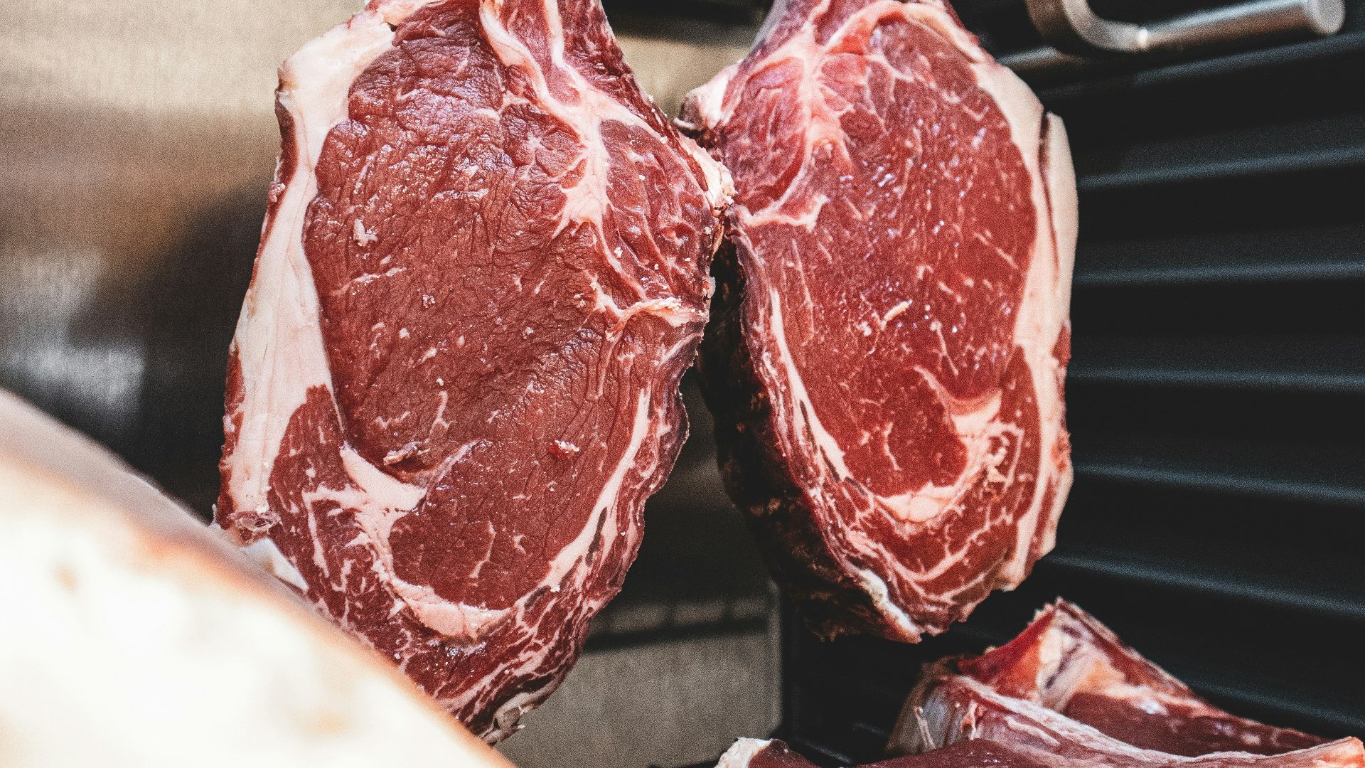 raw meat on stainless steel tray