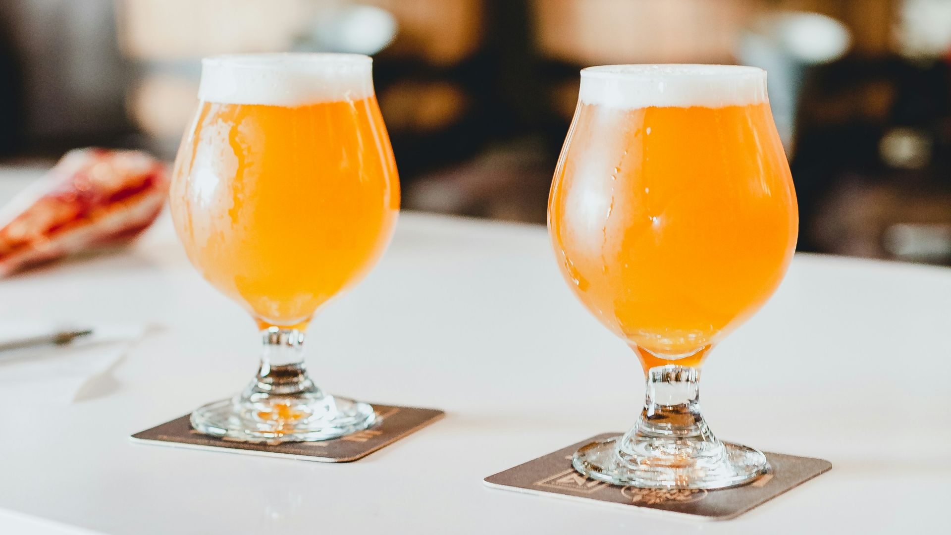 orange juice in clear drinking glass