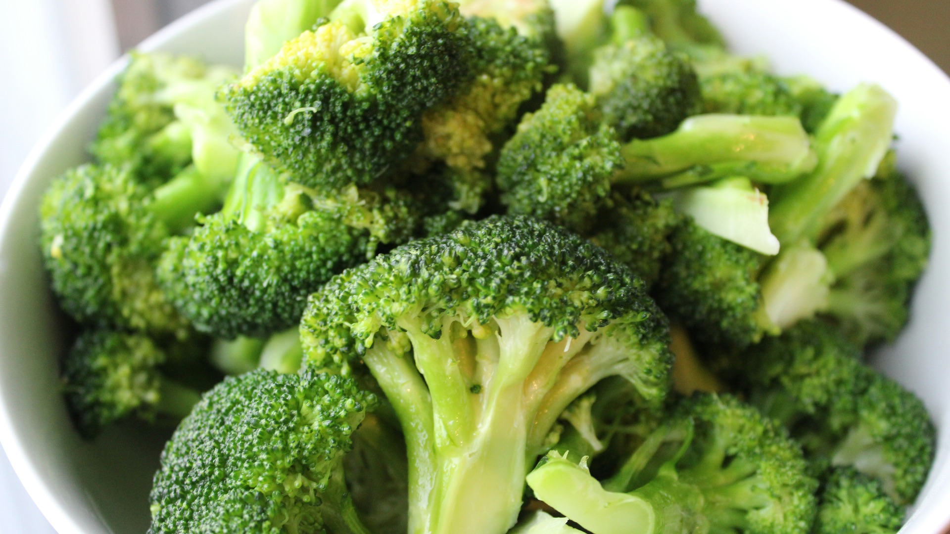 green broccoli on white ceramic plate