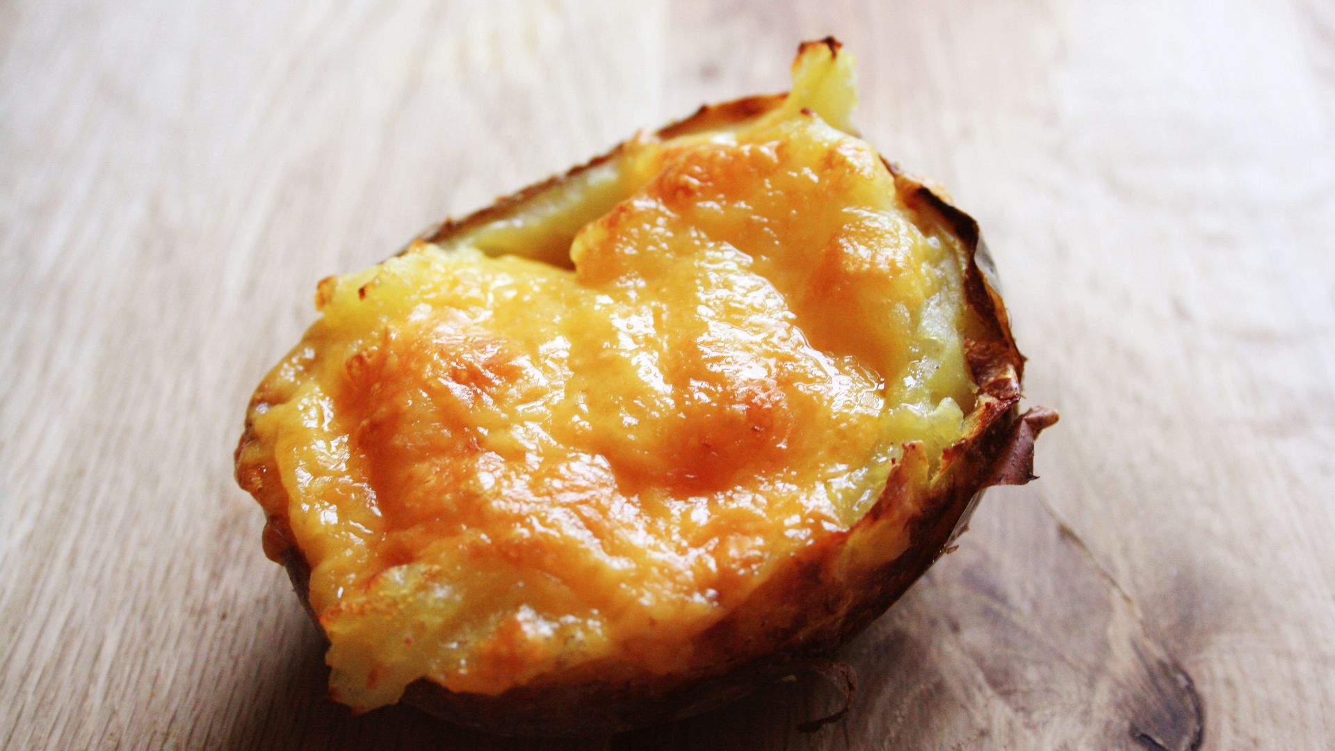 A piece of food sitting on top of a wooden table