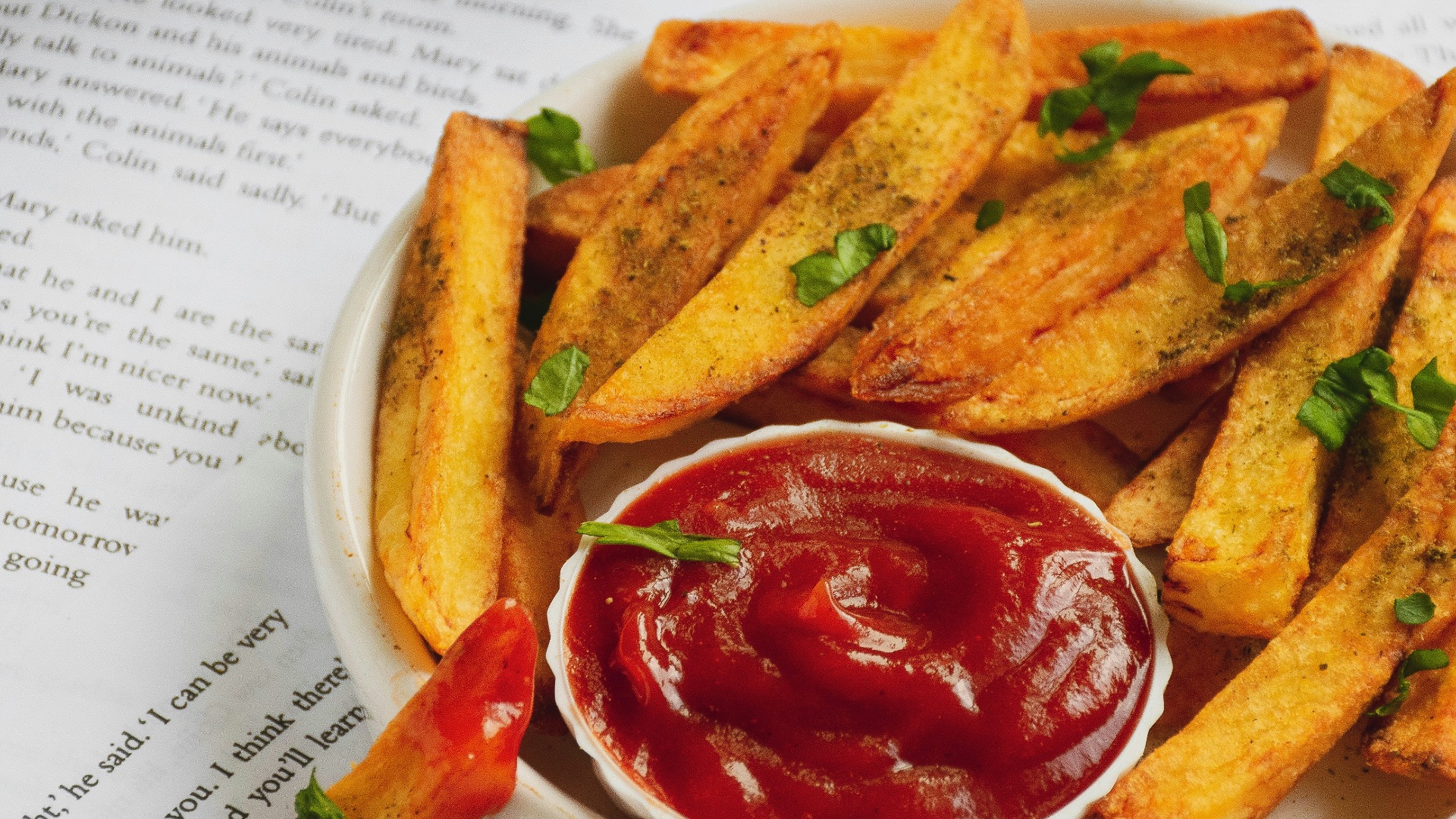 fries and red sauce on white ceramic plate