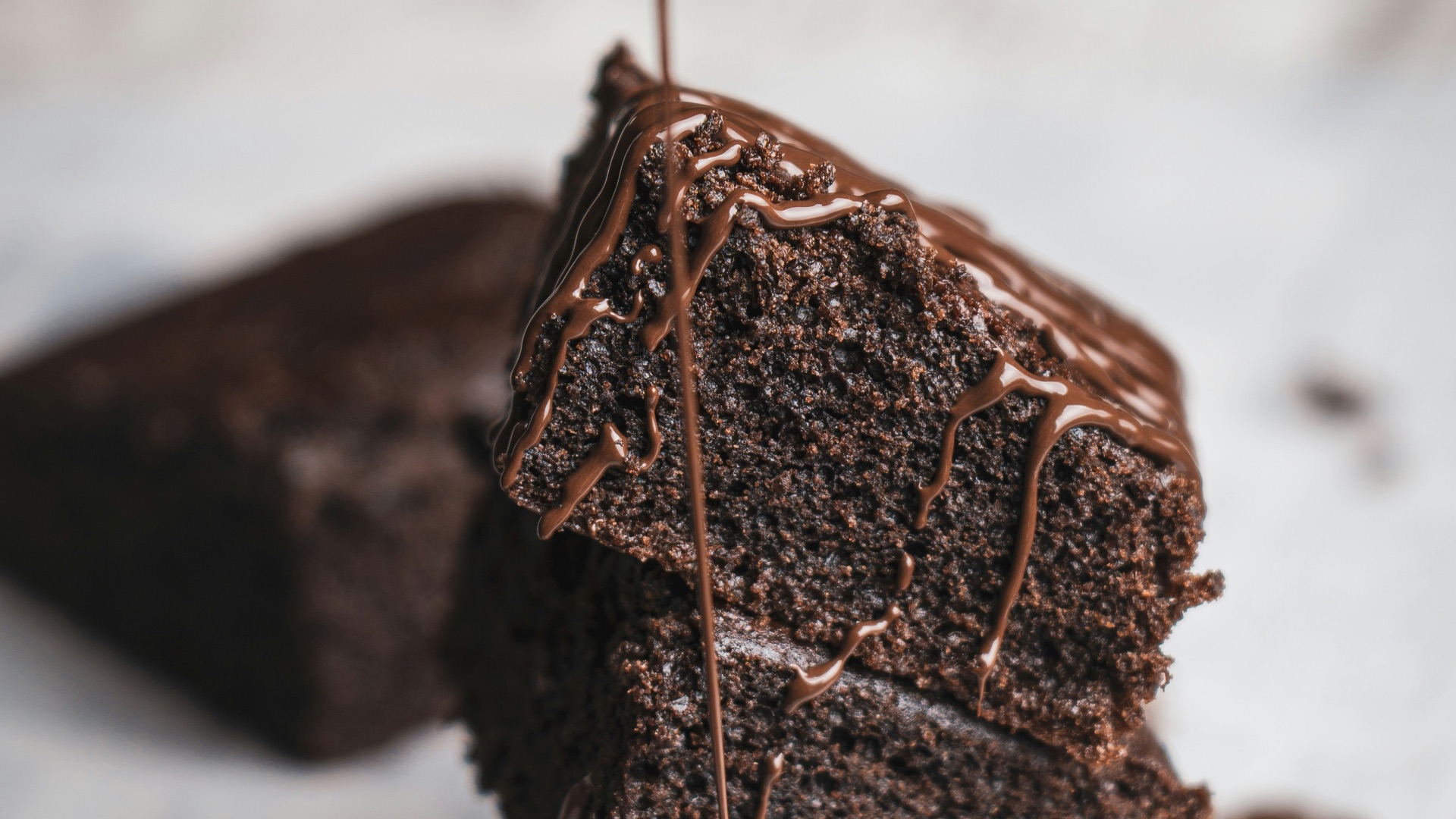 chocolate cake on white ceramic plate