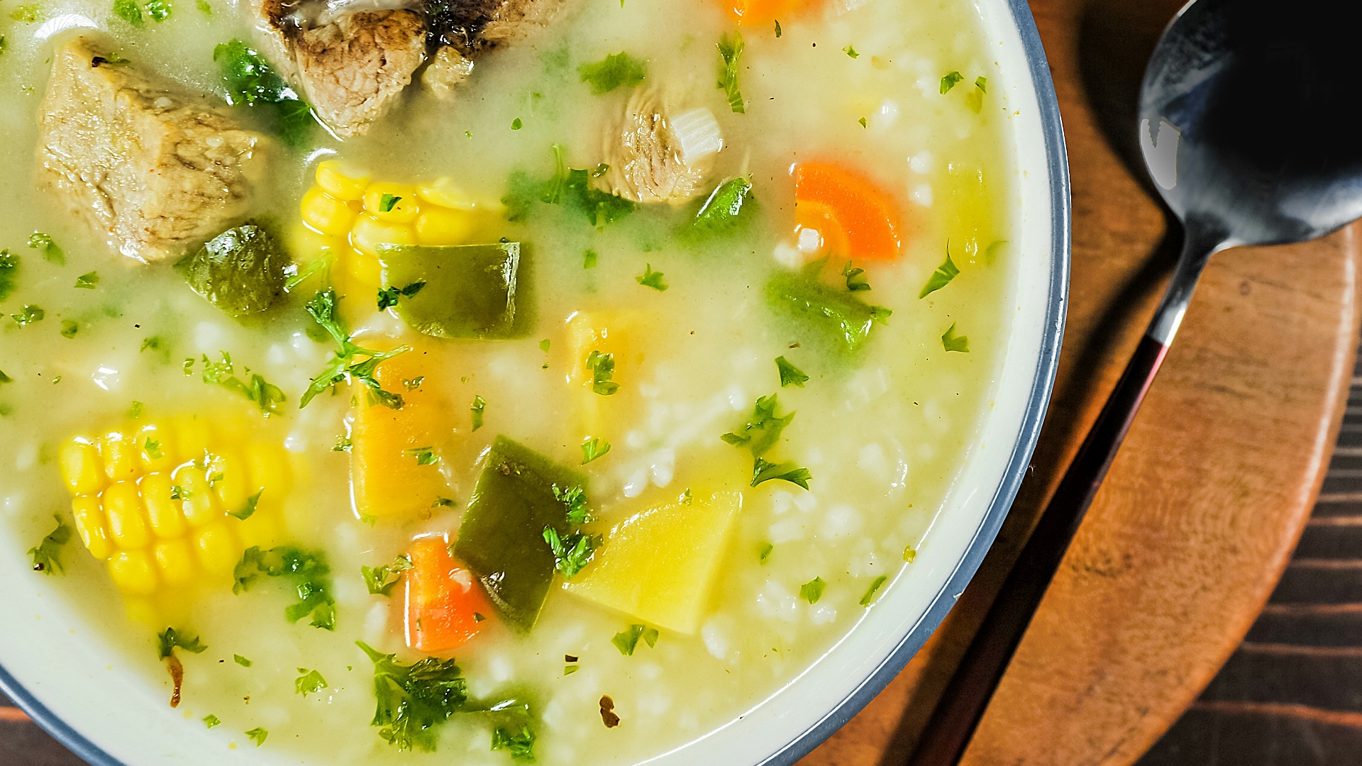 a bowl of soup with a spoon