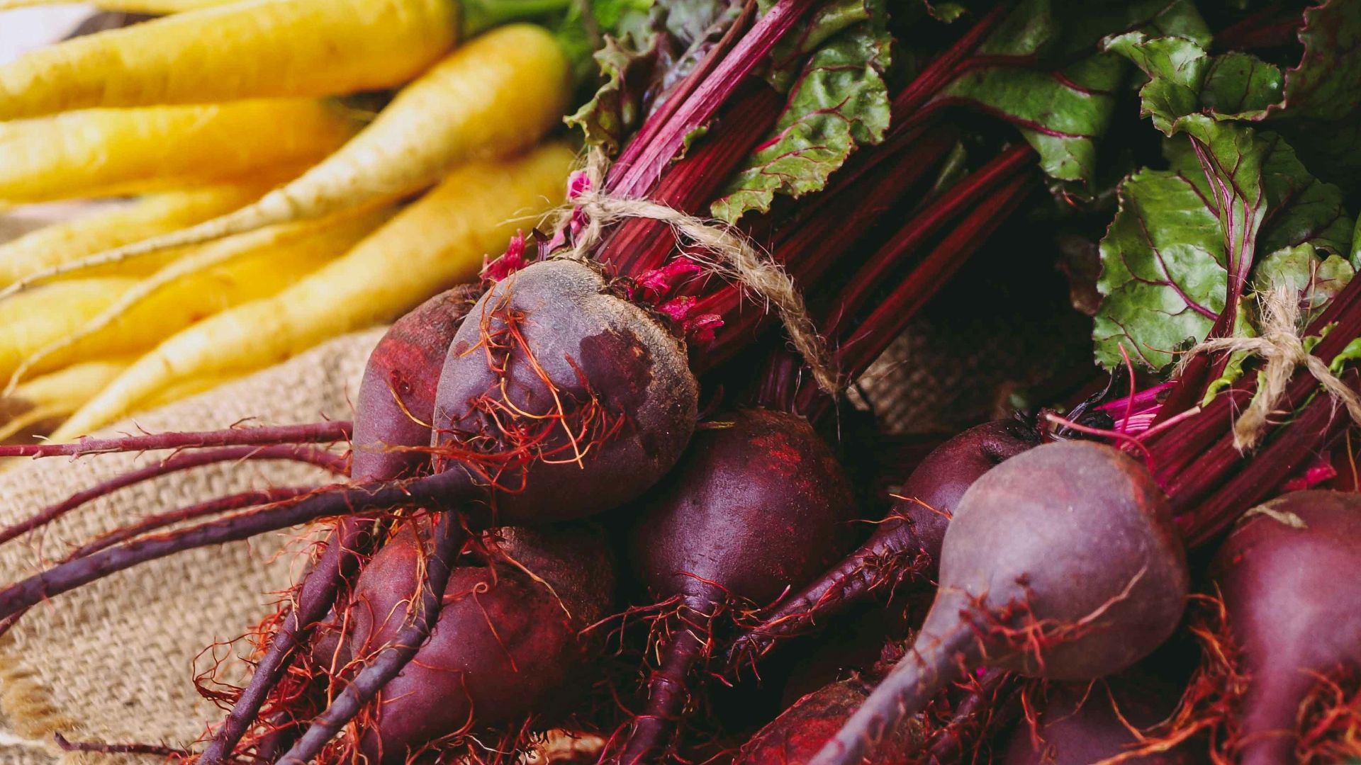 a table topped with lots of different types of vegetables