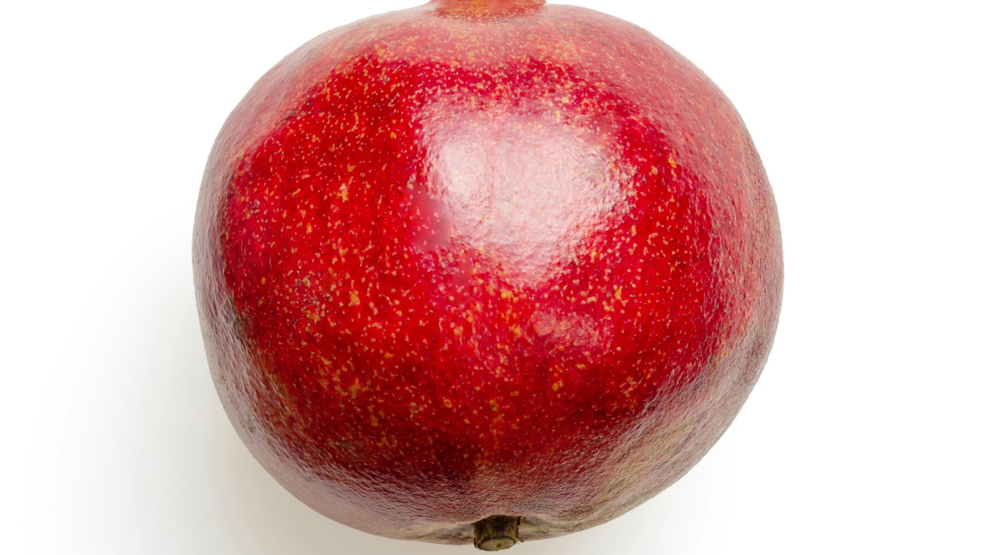 red apple on white surface