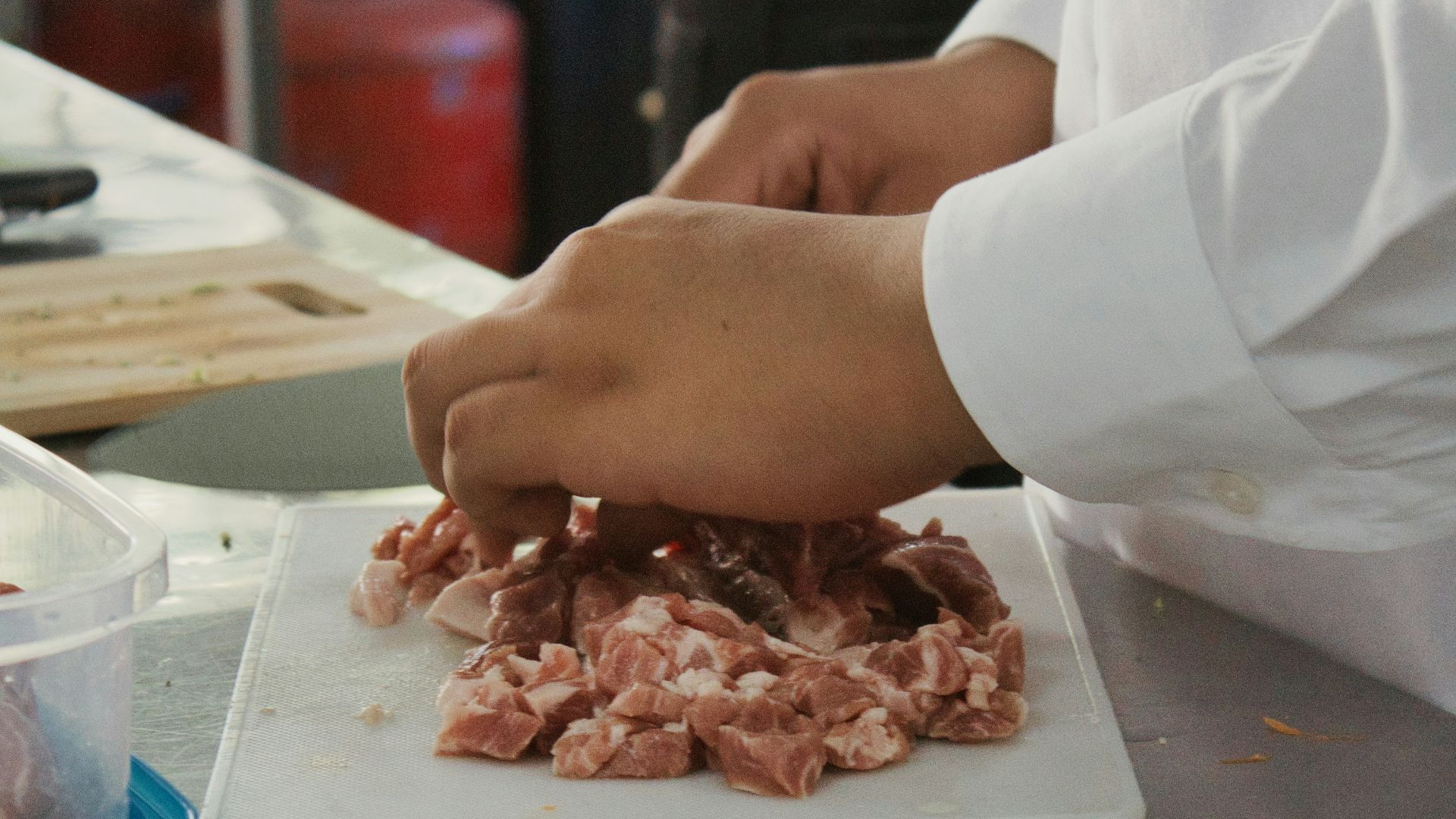 a person holding a tray of food