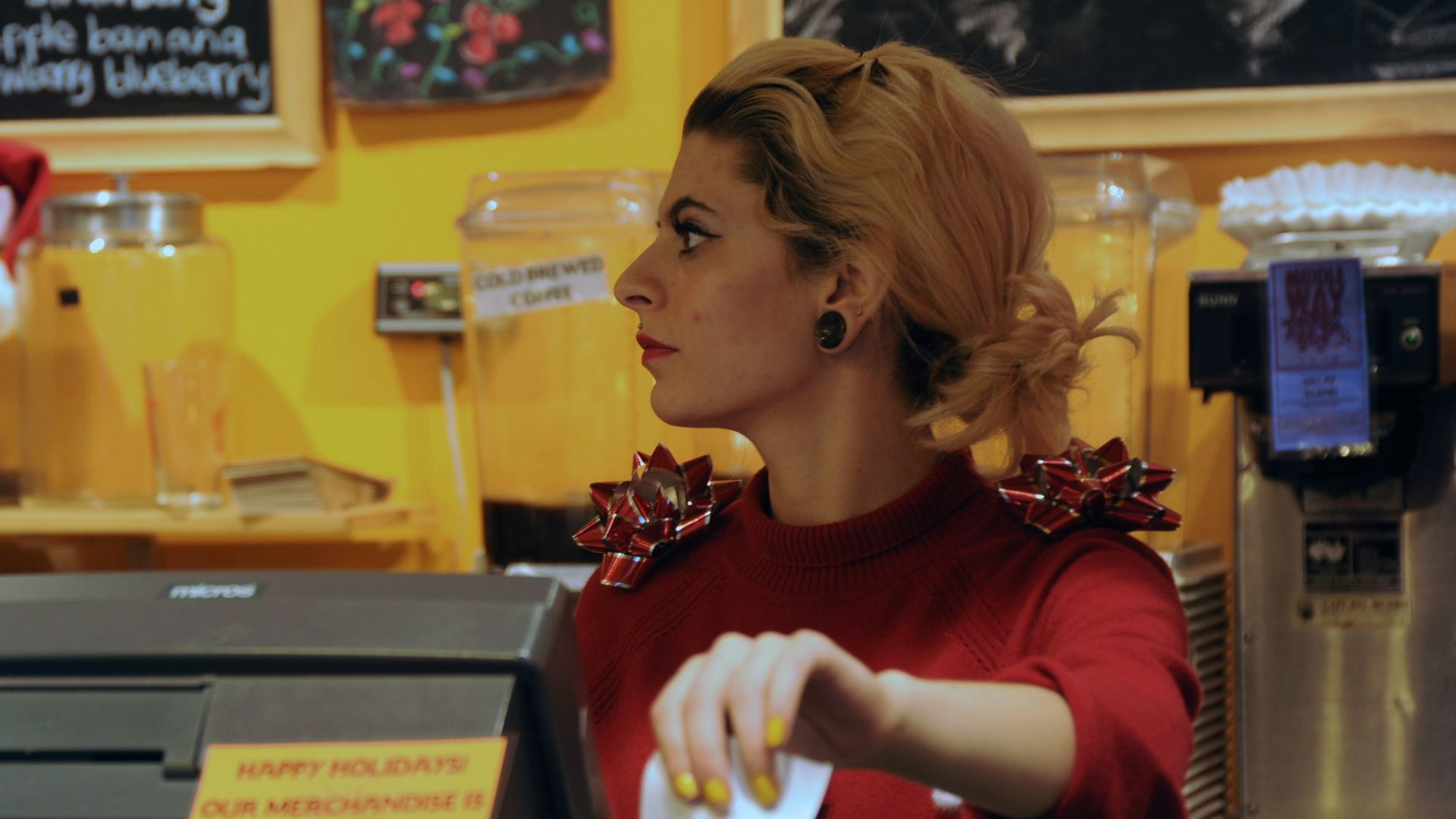 shallow focus photo of woman in red long-sleeved shirt