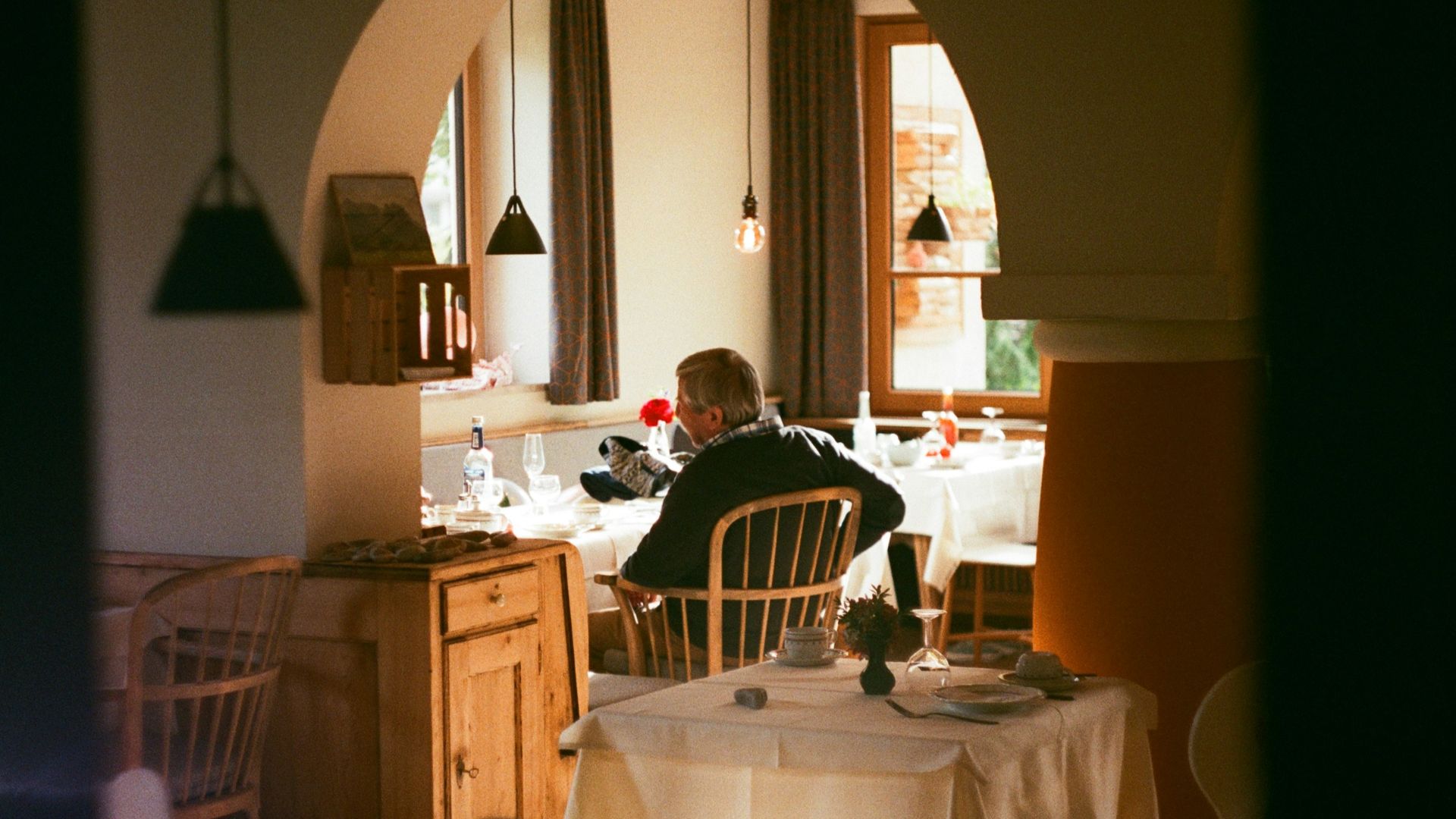 people sitting on dining table