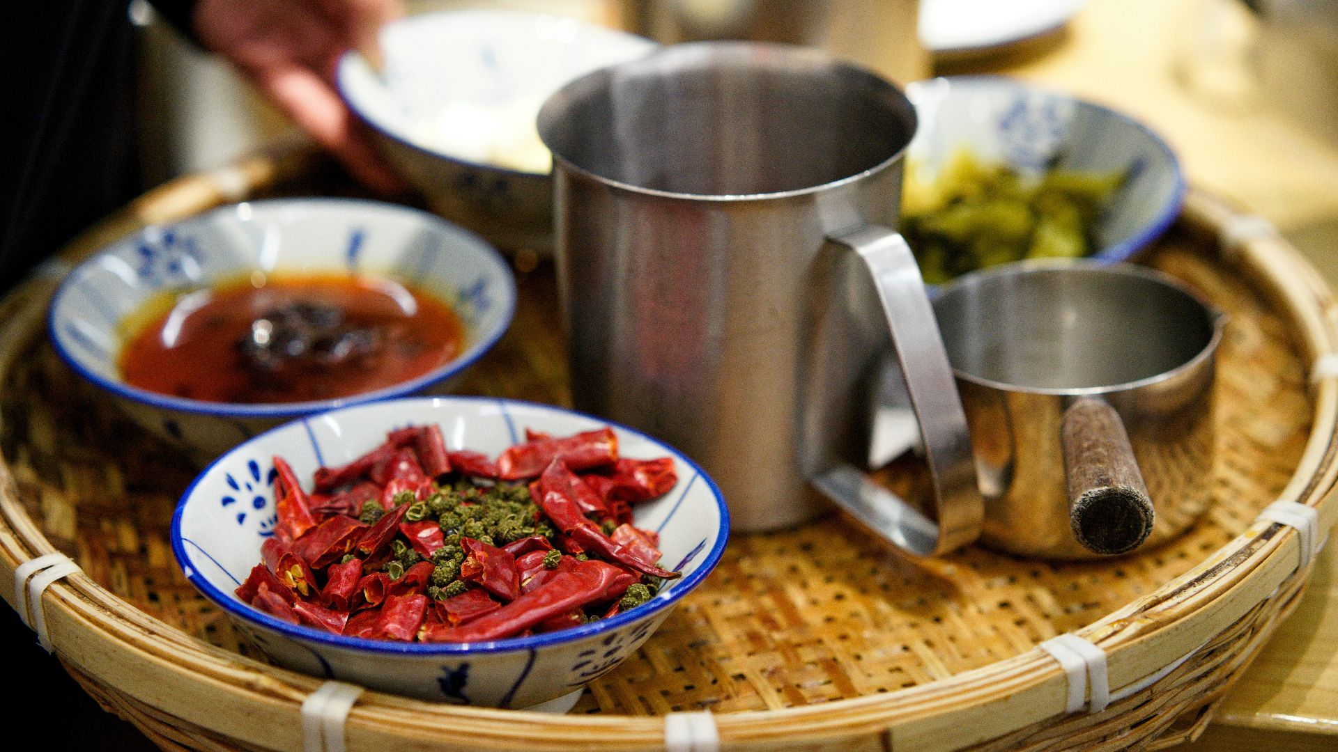 A tray with bowls of food on it