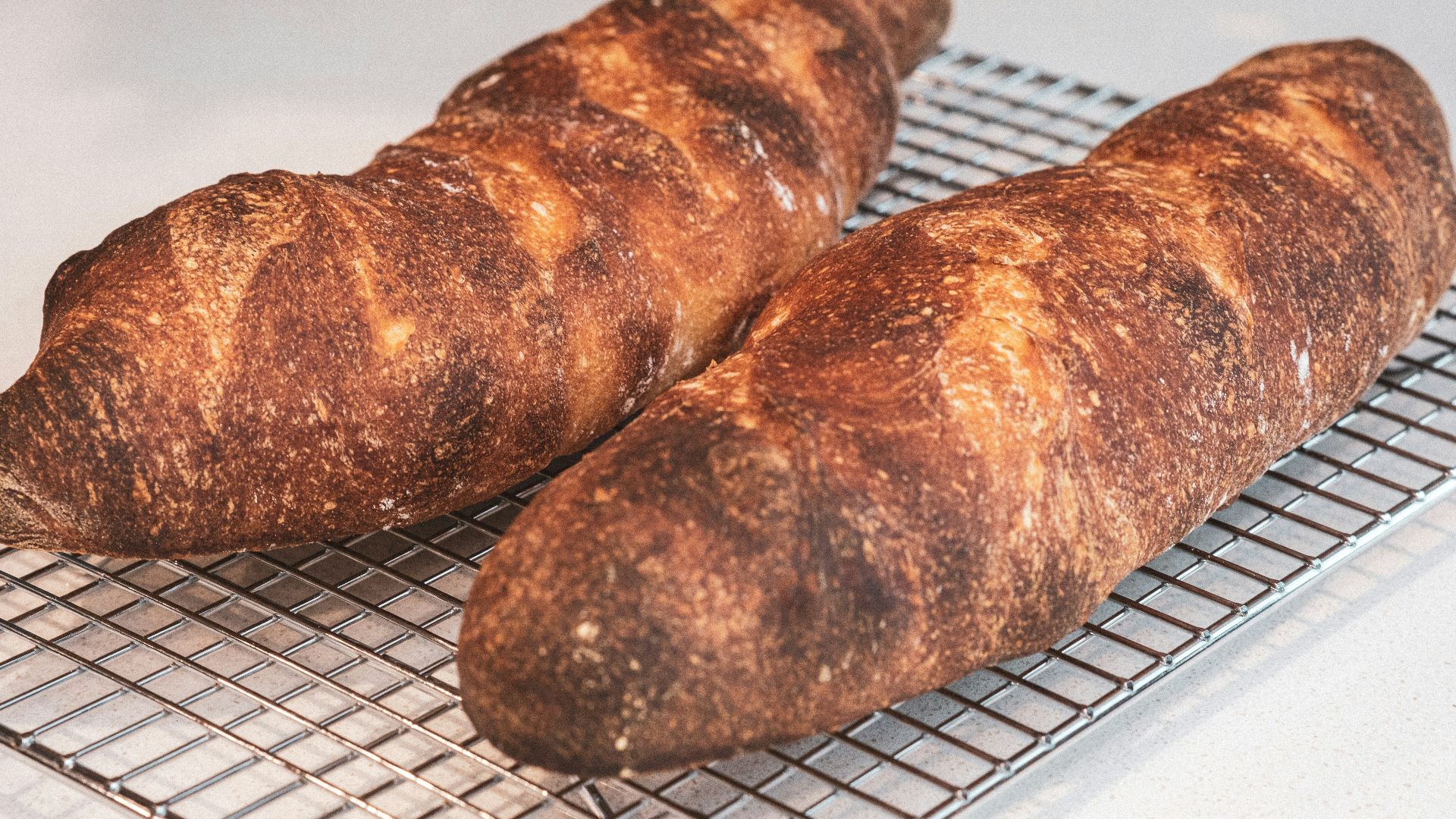 brown bread on white and black checkered textile