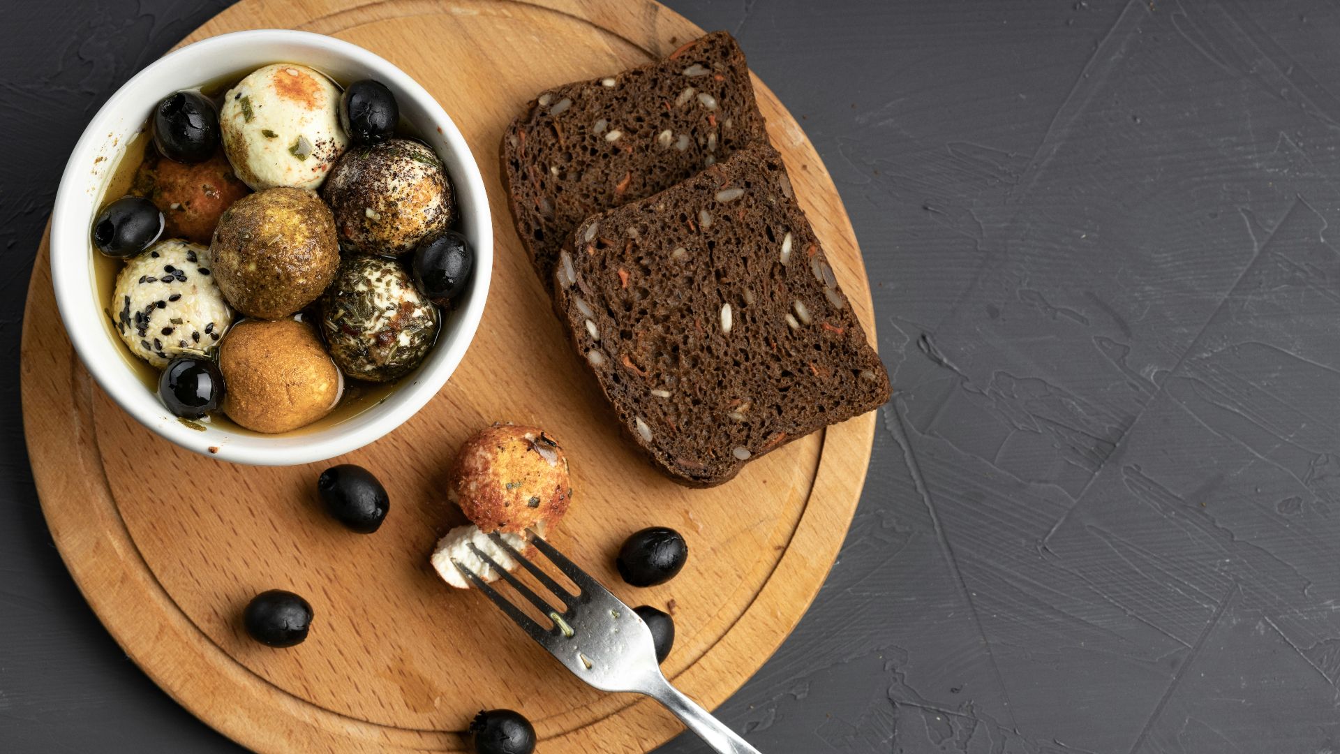 sliced bread on brown wooden chopping board