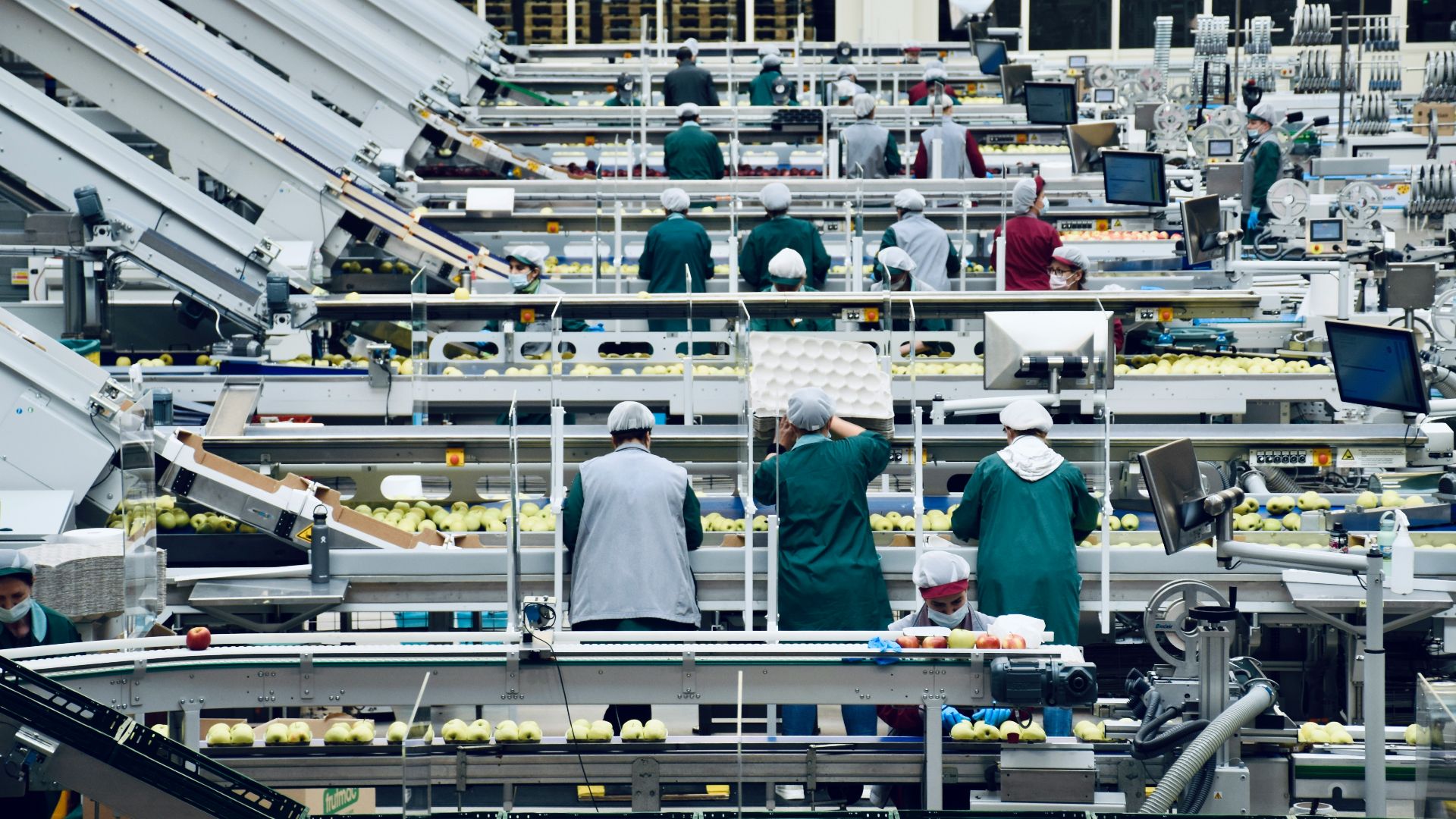 a group of people in a factory