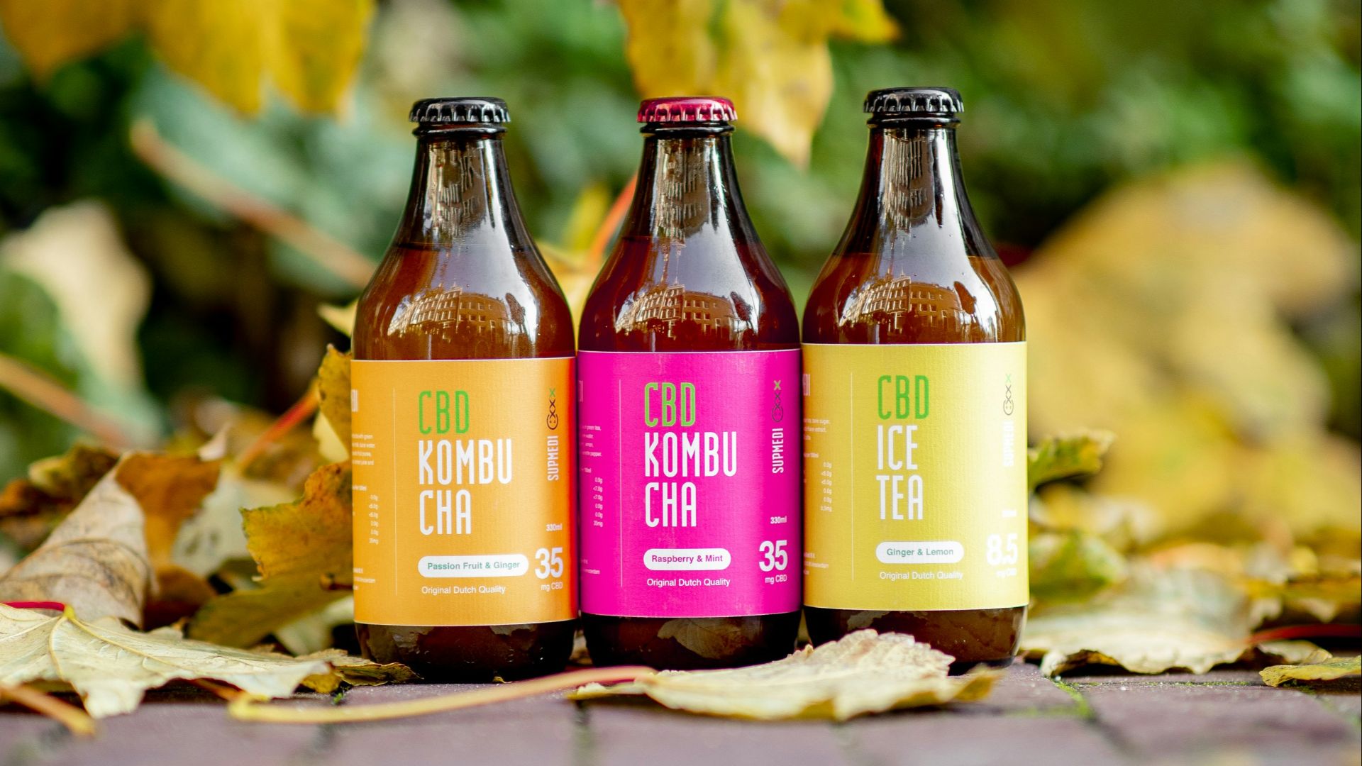 three amber glass bottles