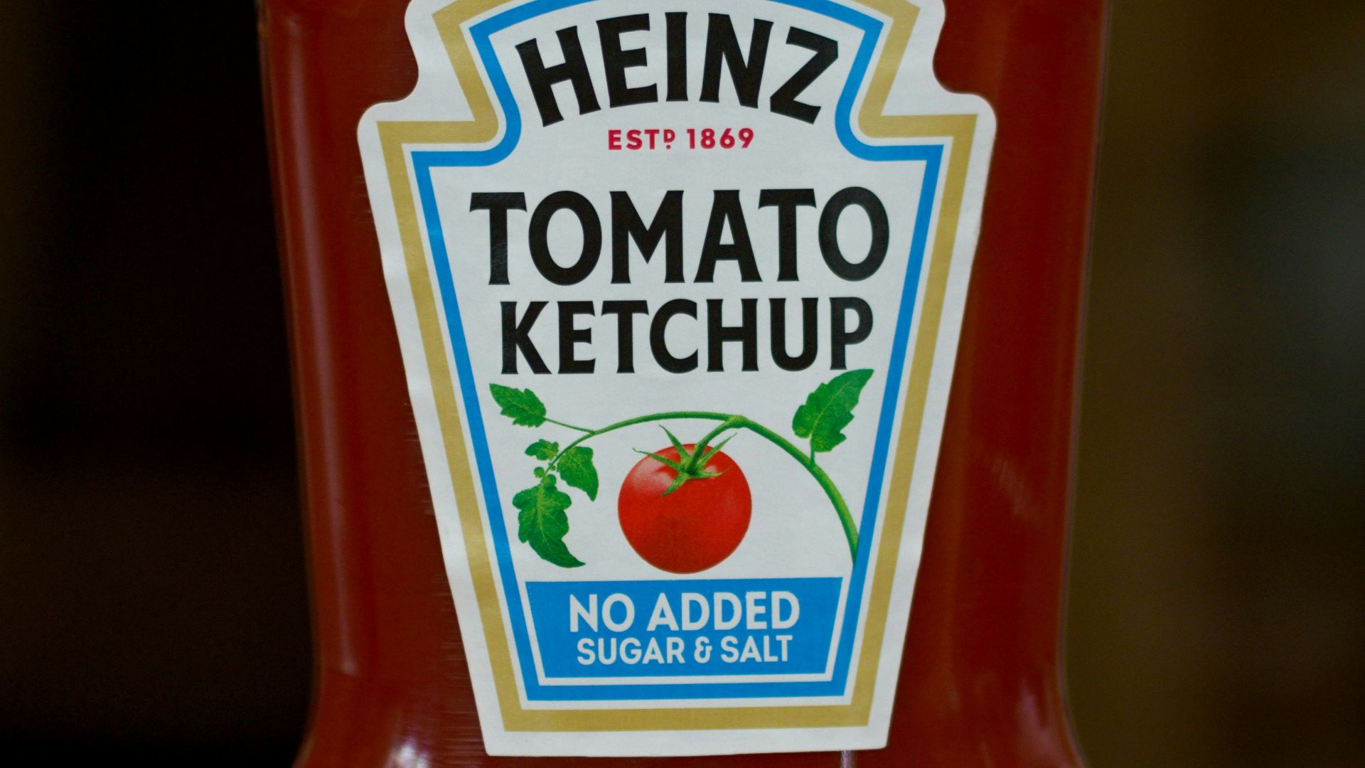 heinz tomato ketchup bottle on brown wooden table