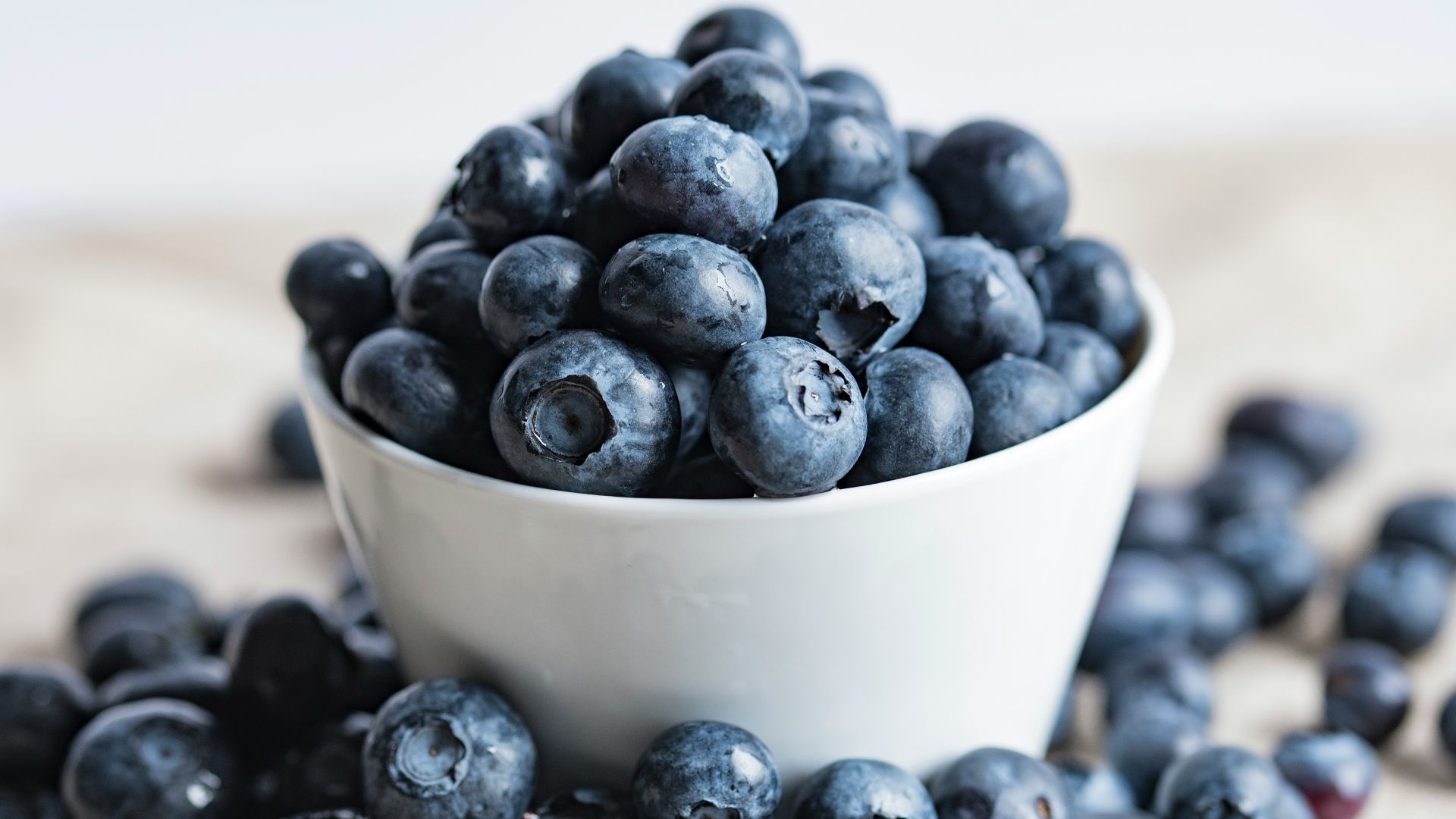 blueberries on white ceramic container