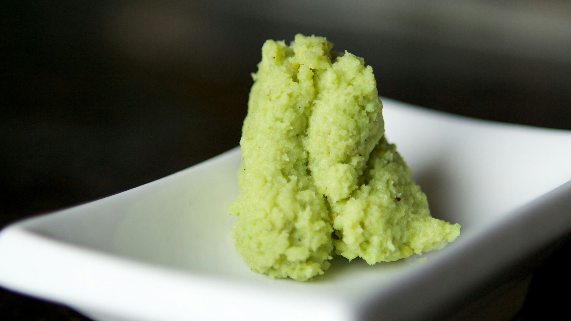green powder on white ceramic plate