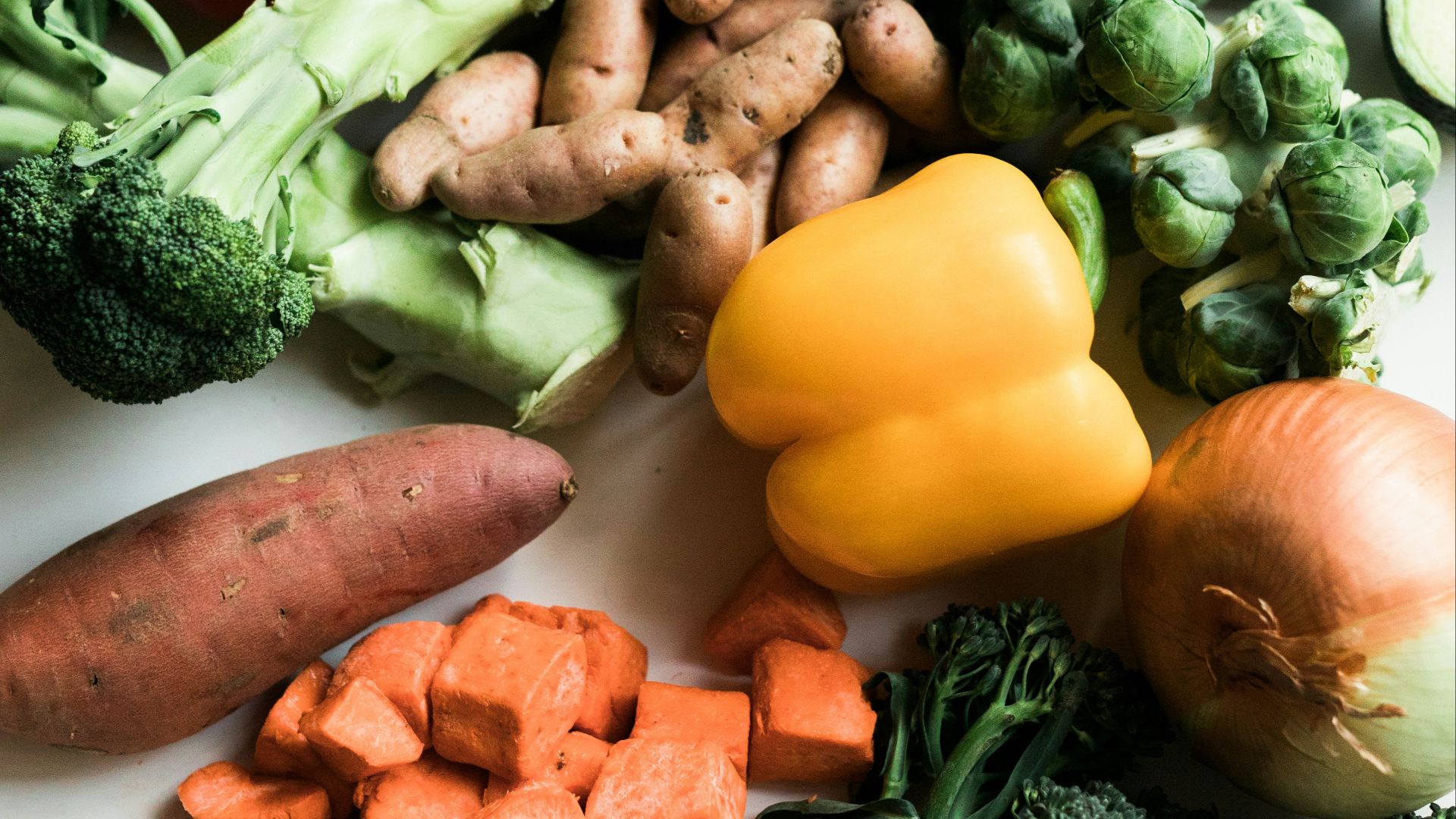 sliced carrots and green vegetable