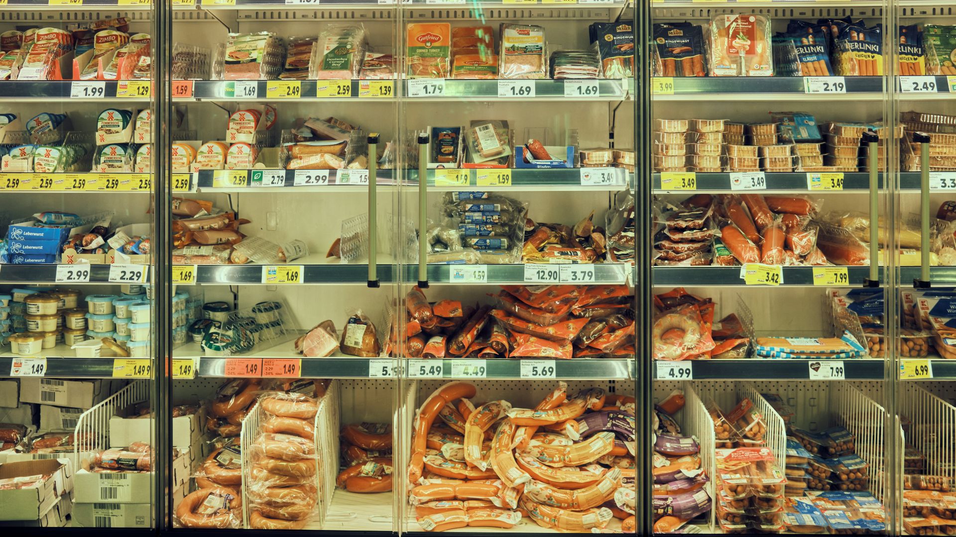 a display case filled with lots of different types of food