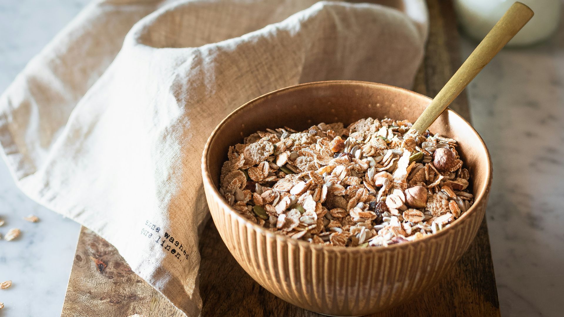 brown wooden bowl with brown powder