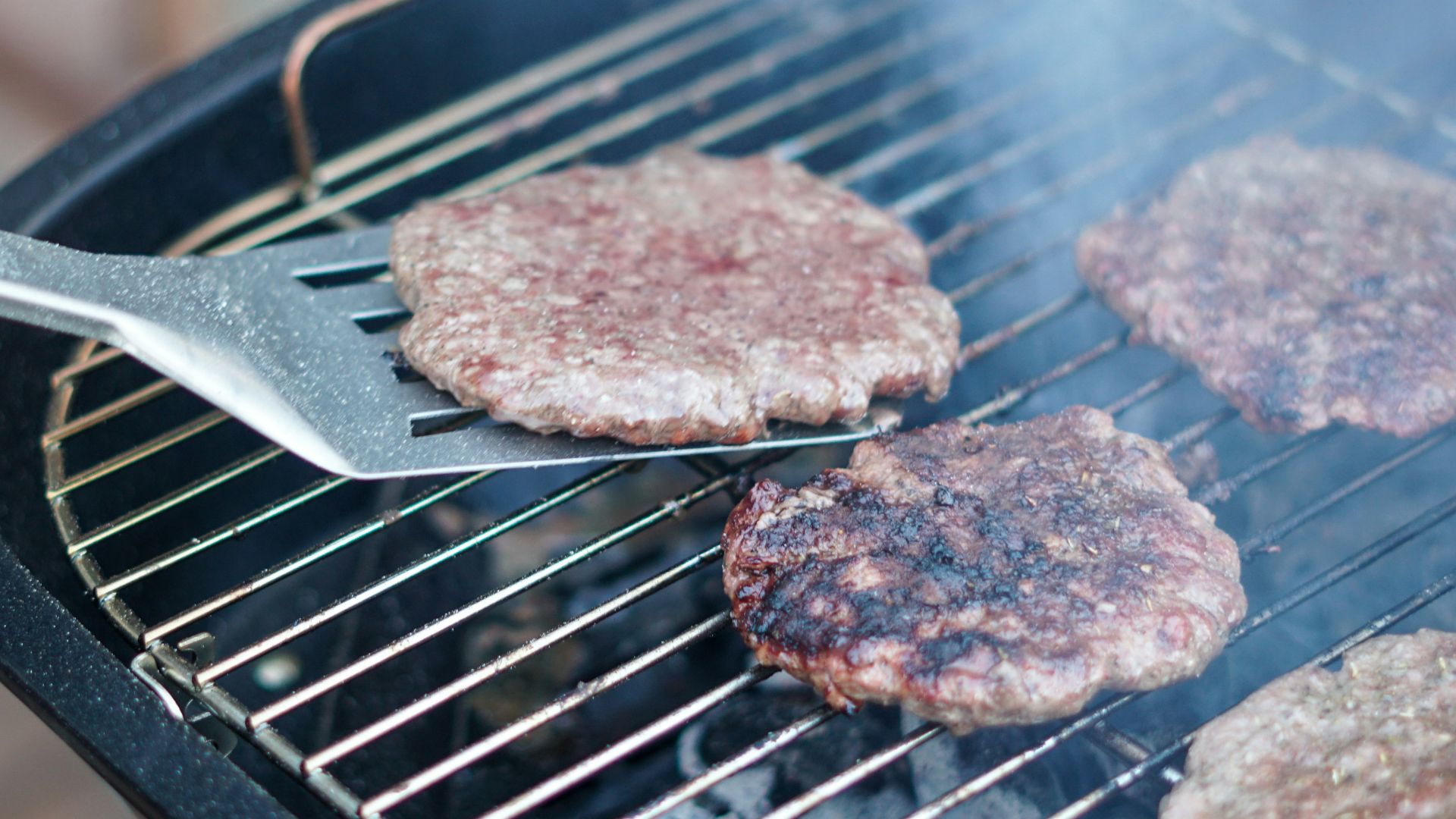 brown meat on black grill