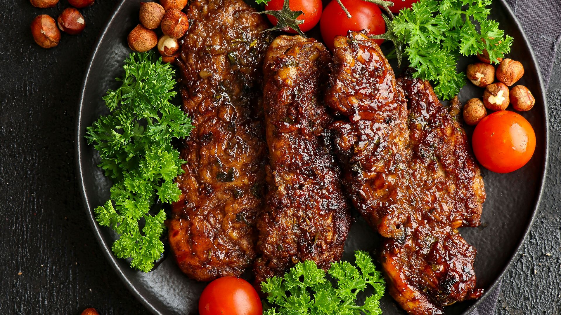 a plate of meat and vegetables on a table