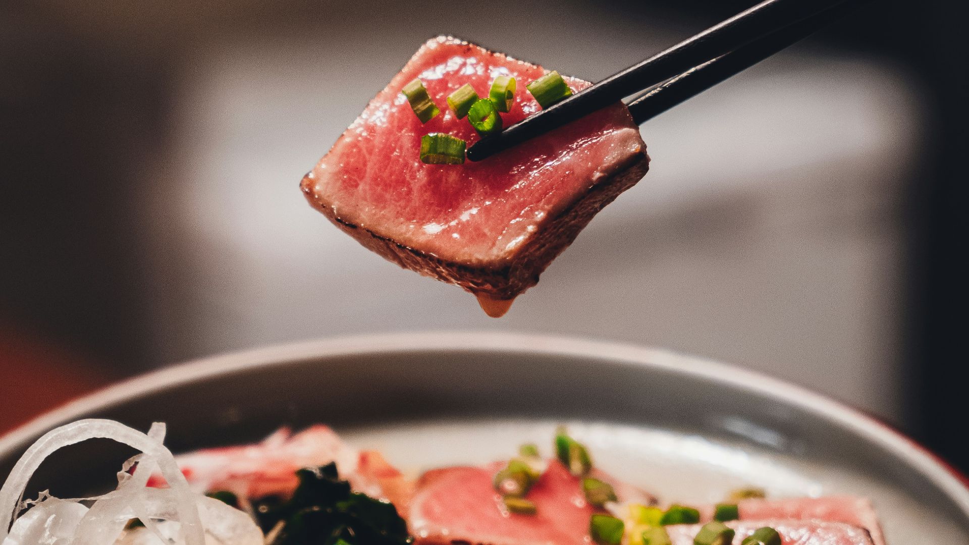 stainless steel fork on white ceramic plate