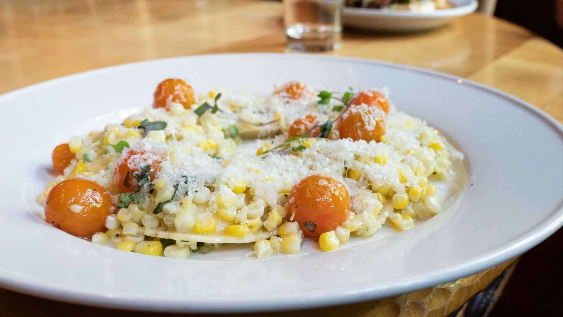 a plate of food on a wooden table