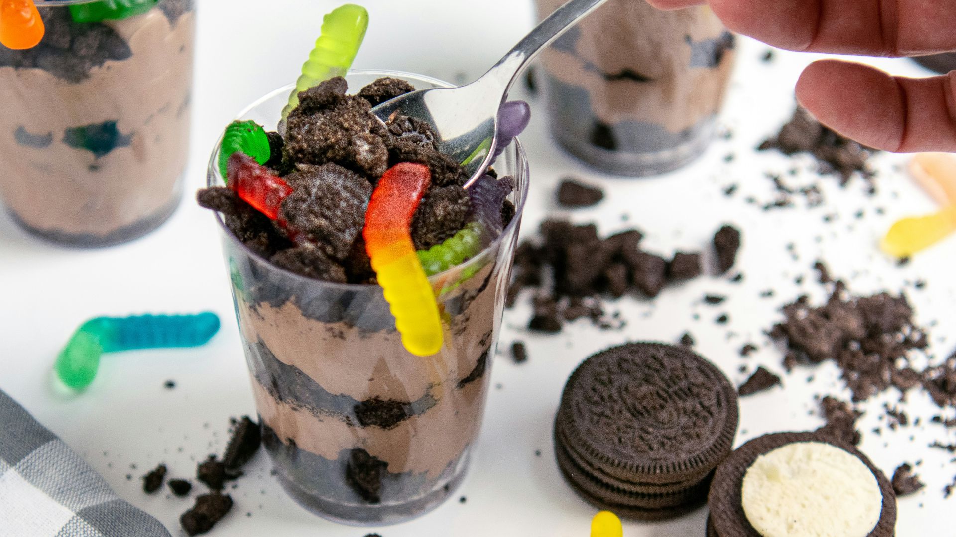 Chocolate pudding parfait with oreos and gummy worms