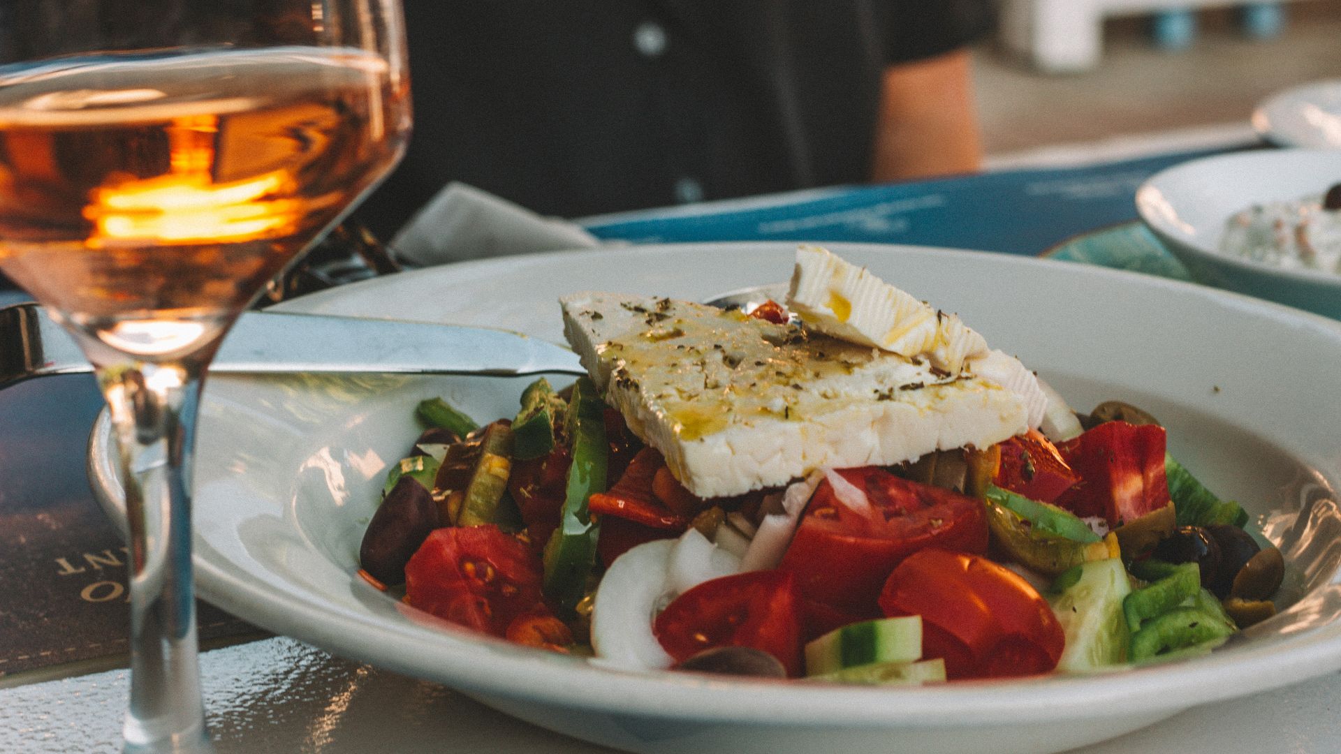sliced tomato and cucumber on white ceramic plate